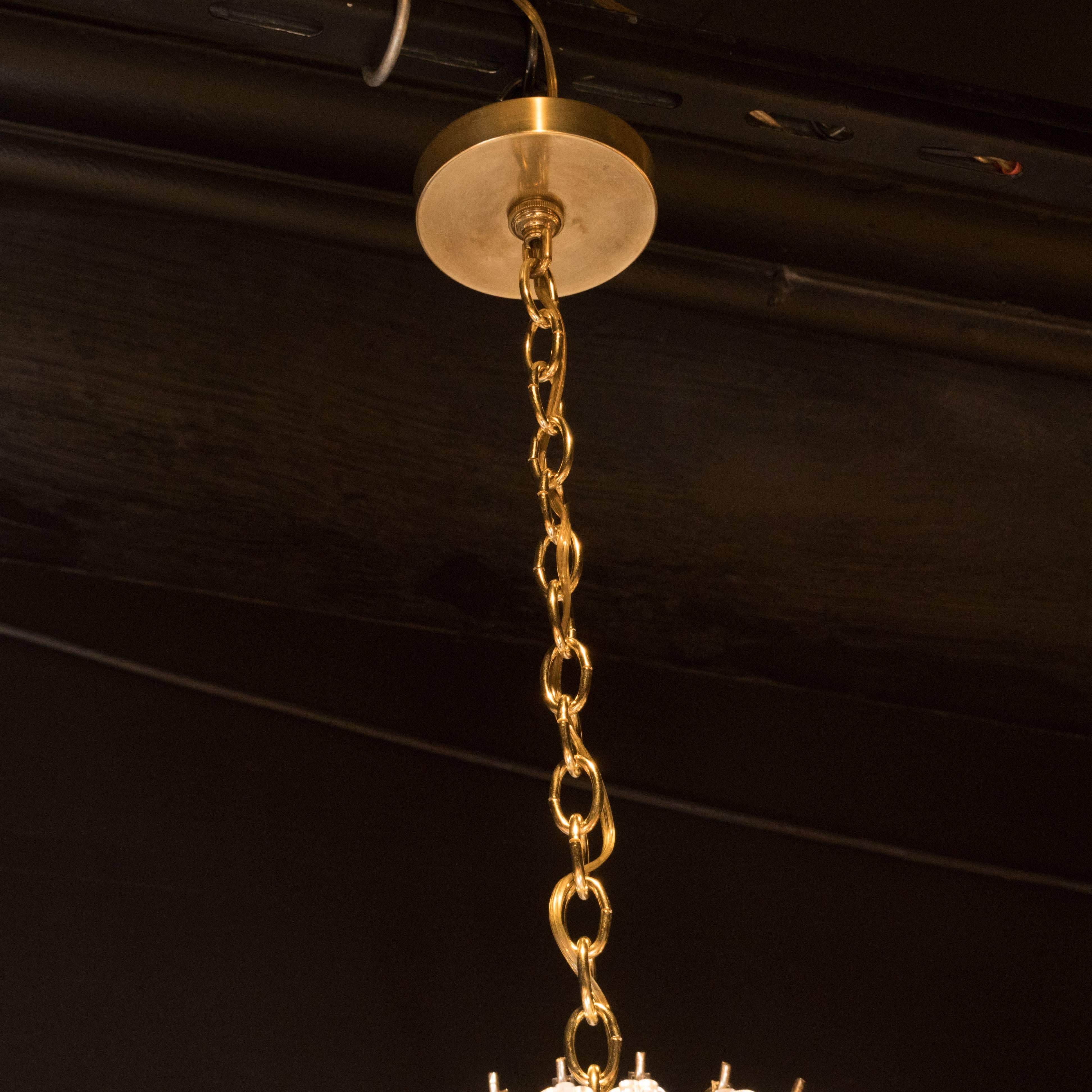 Italian Mid-Century Modern Three-Tier Cut Triedre Camer Glass and Brass Chandelier For Sale
