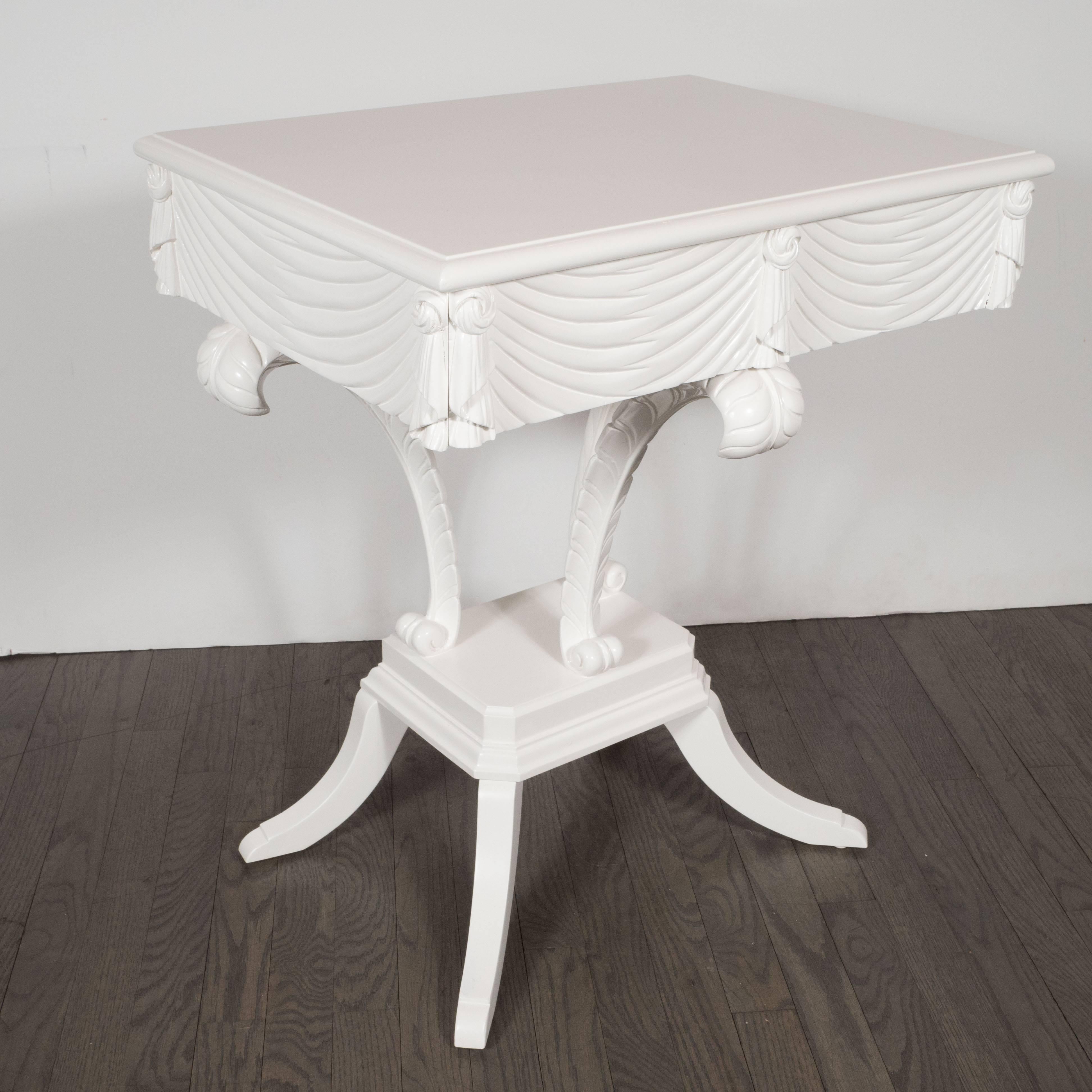 This stunning pair of white lacquer end tables were realized by the illustrious American firm, Grosfeld House- where legendary designers such as Lorin Jackson got their start, circa 1945. Recalling the glamour and old world sophistication typical of