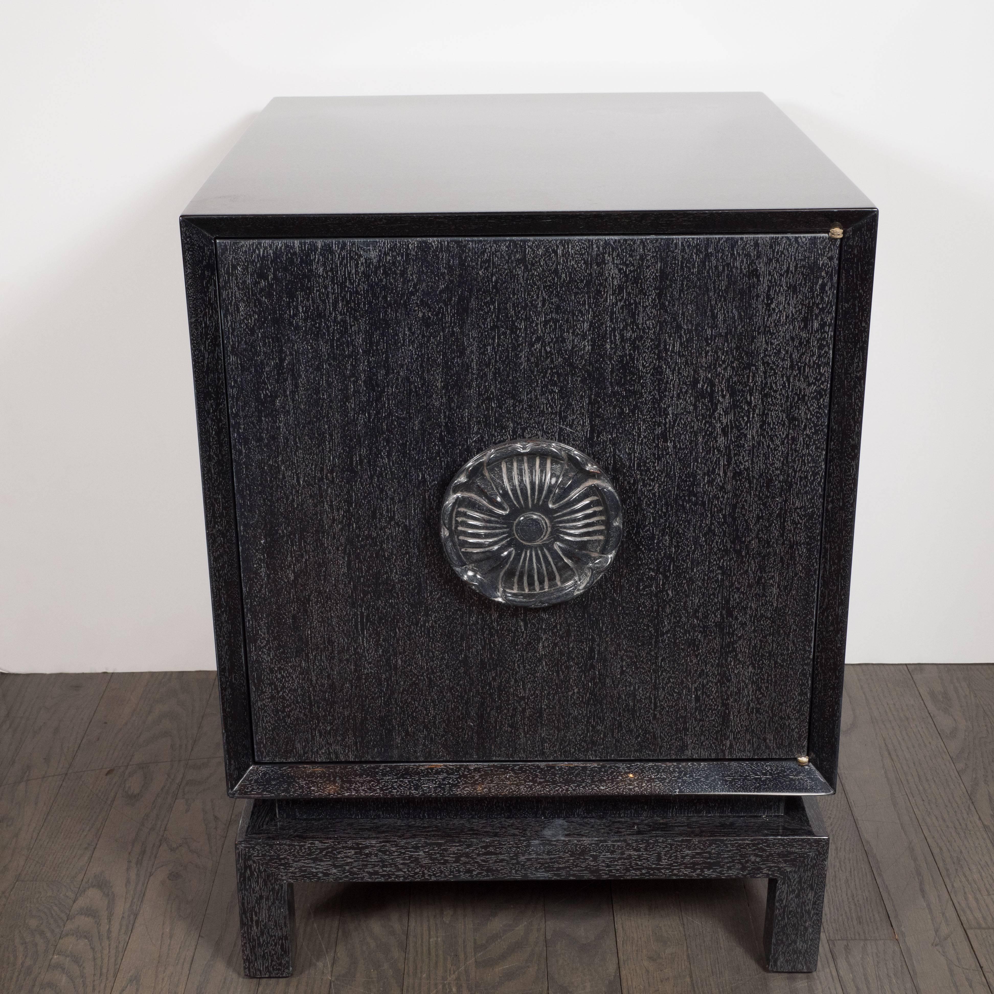 This elegant and stylish pair of nightstands were realized by esteemed Art Deco designer- whose clientele included everyone from Frank Costello and Lucky Luciano to Irving Berlin and Bob Hope- in the United States, circa 1950. They feature a tiered