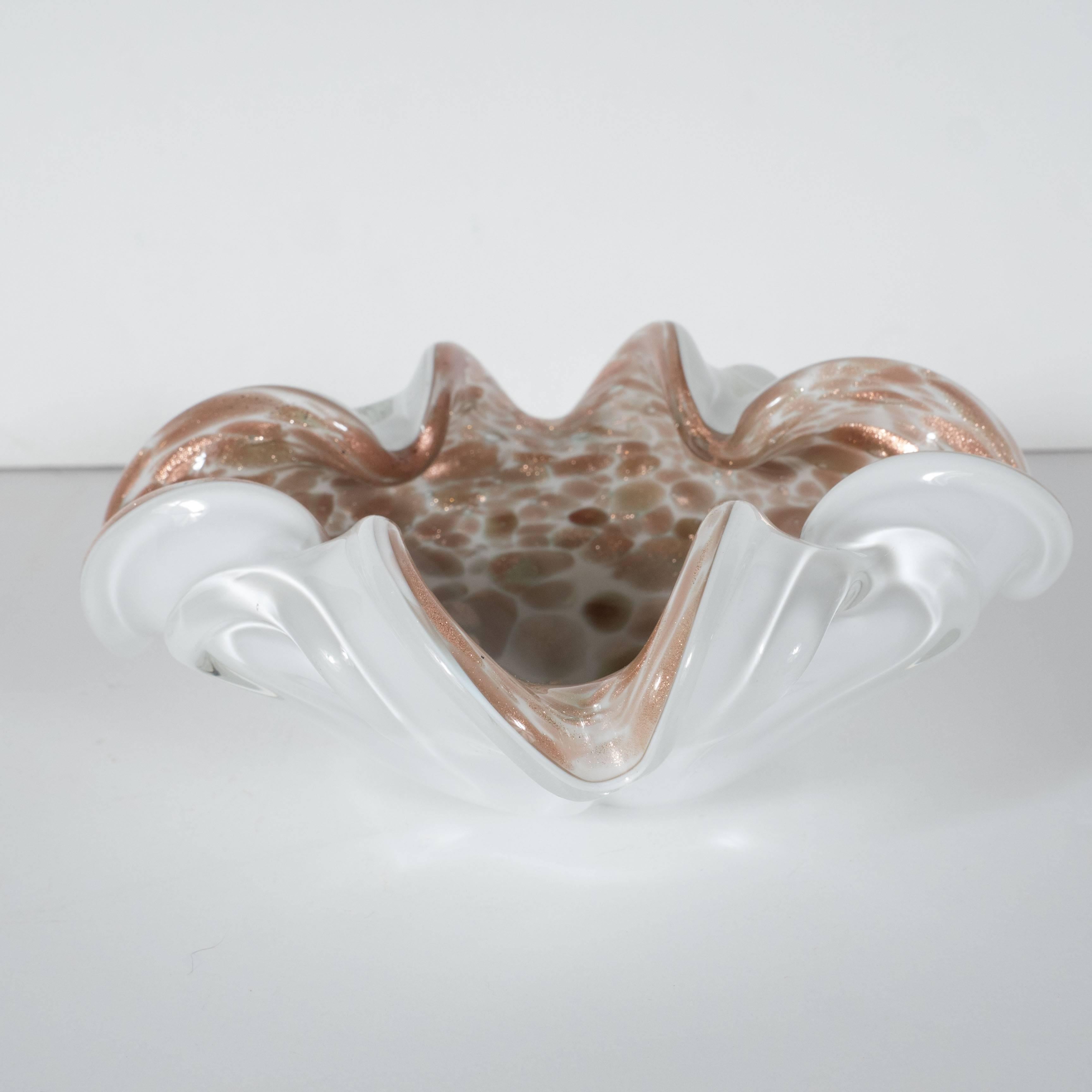 This stunning organic freeform bowl features a rich 24 karat rose gold swirls amidst a white background with faint swirls of sky blue. This bowl is in excellent condition.
Italy, circa 1950
Measures: Width 6.25
depth 6.25
height 3.25.
 