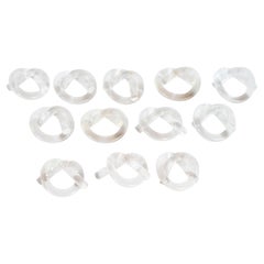 Set of Twelve Mid-Century Modern Lucite Pretzel Napkin Rings by Dorothy Thorpe