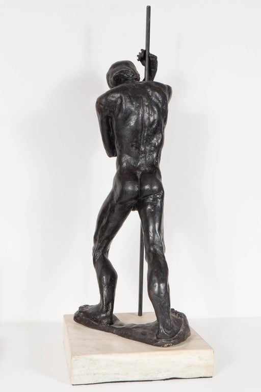 Mid-20th Century Bronze Man With a Staff by Dori Gallione on a White Marble Base