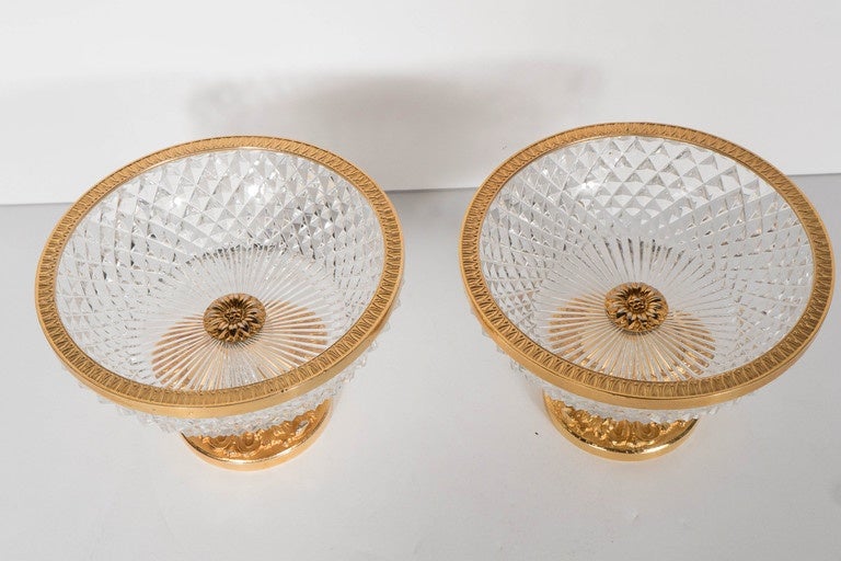 This gorgeous pair of crystal compotes are fitted with gilded bronze mounts neoclassical in form with stylized acanthus detailing.The crystal bowl features a diamond cross hatched design.These are also great accent pieces.,serving pieces, they can