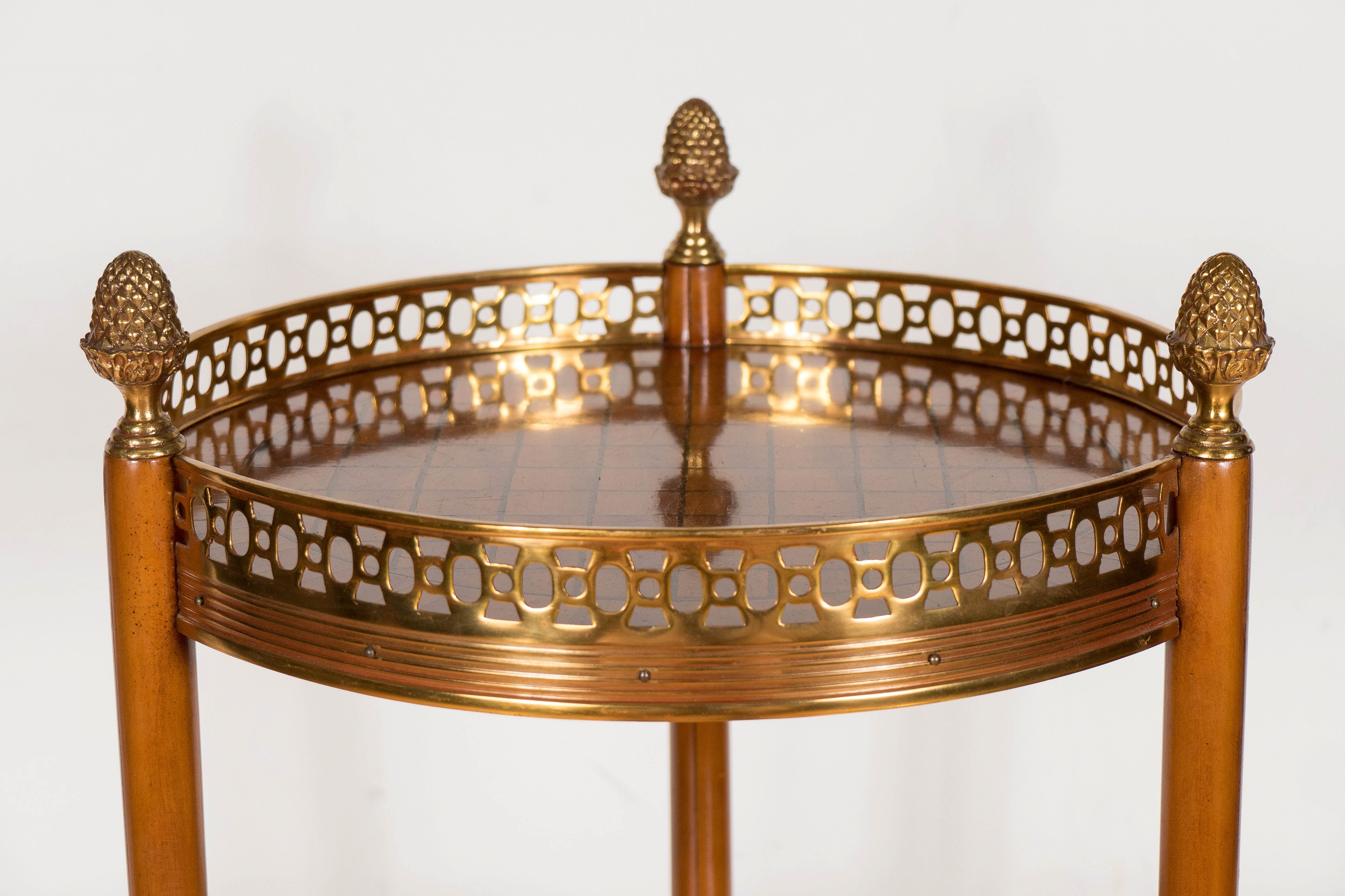 20th Century  Elegant Three-Tiered Table in Amboyna Wood with Gilded Brass Cage and Accent