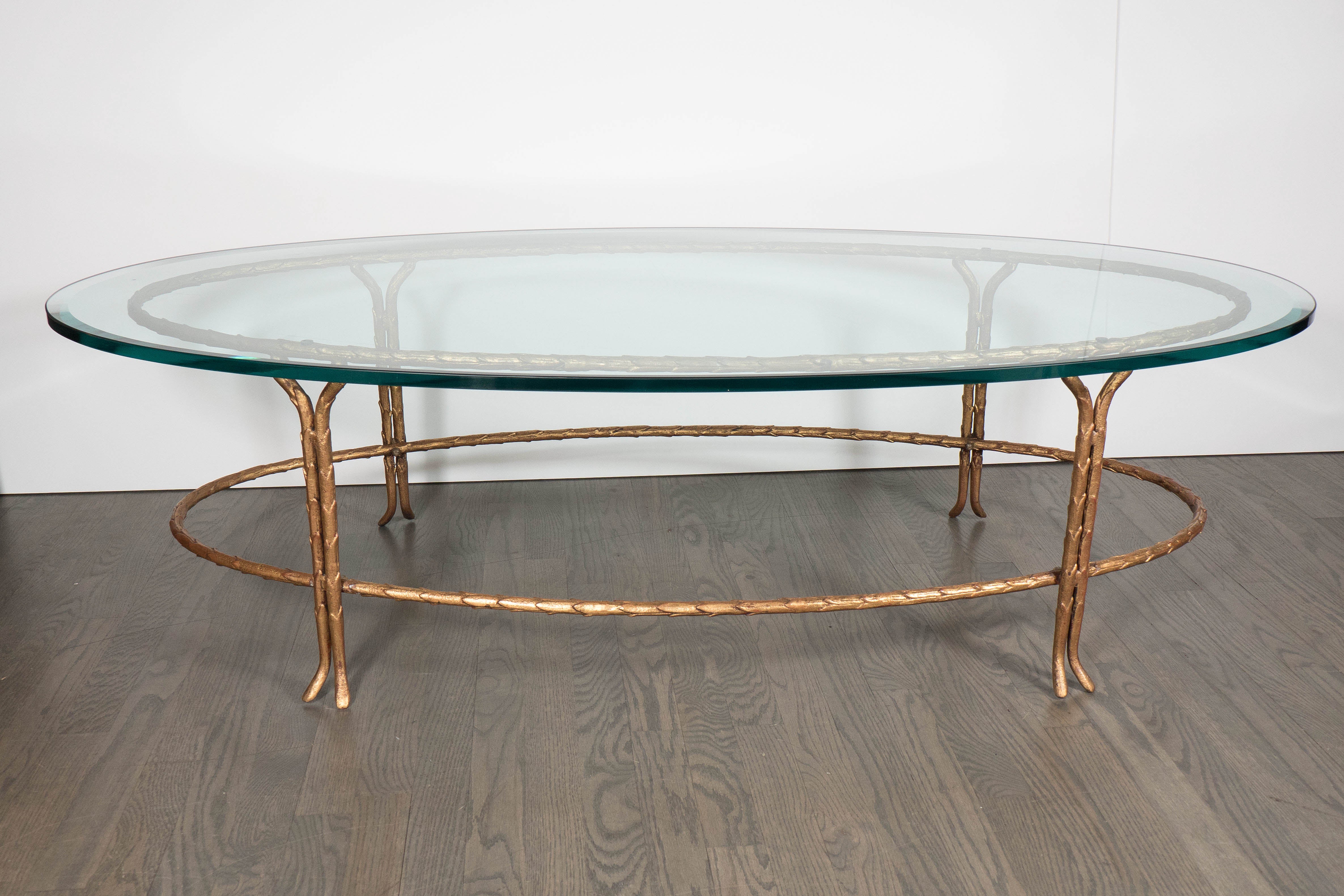 Elegant Bagues Gilt Bronze Oval Cocktail Table with Beveled Glass Top