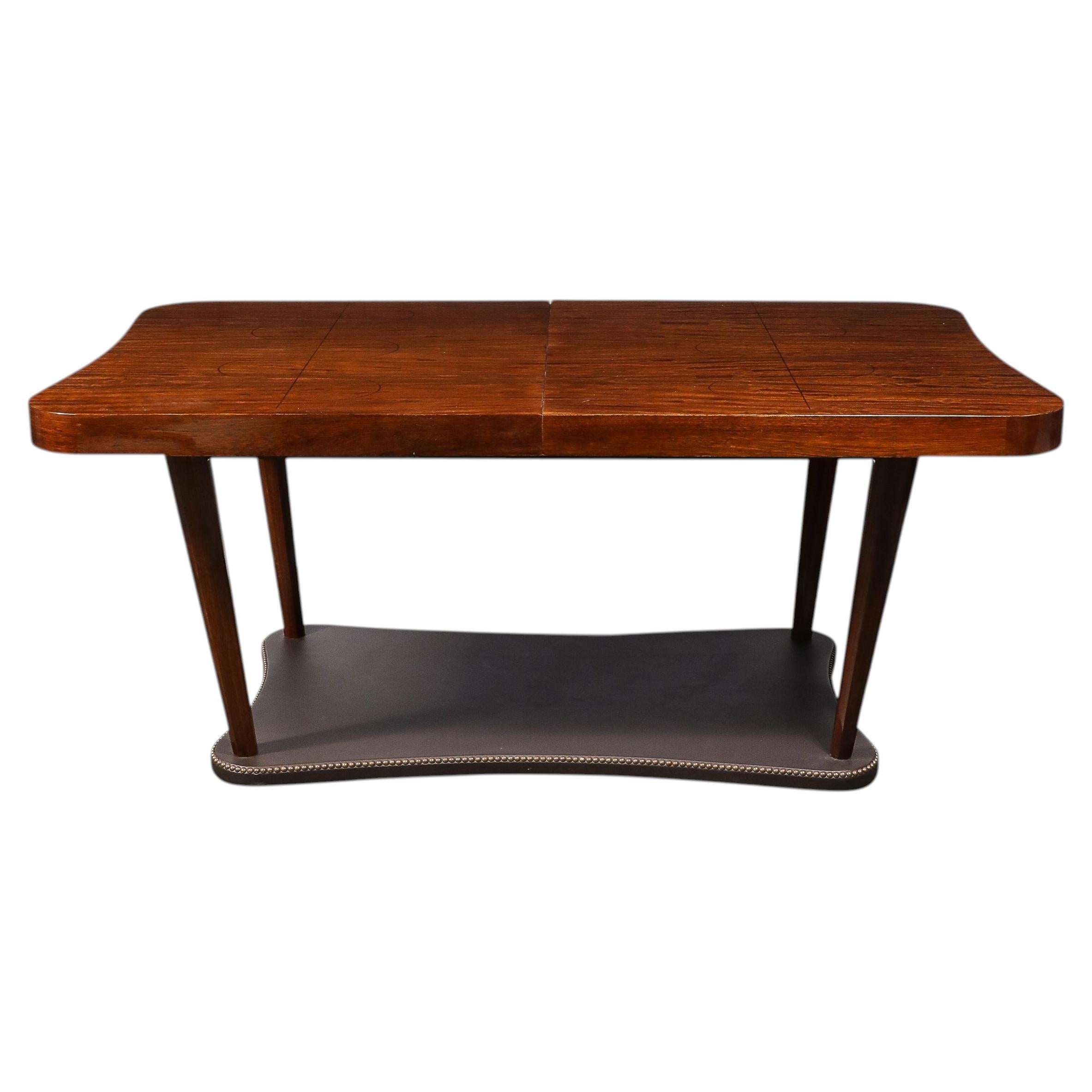 Art Deco Extendable Paldao Series Walnut & Leather Dining Table by Gilbert Rohde For Sale