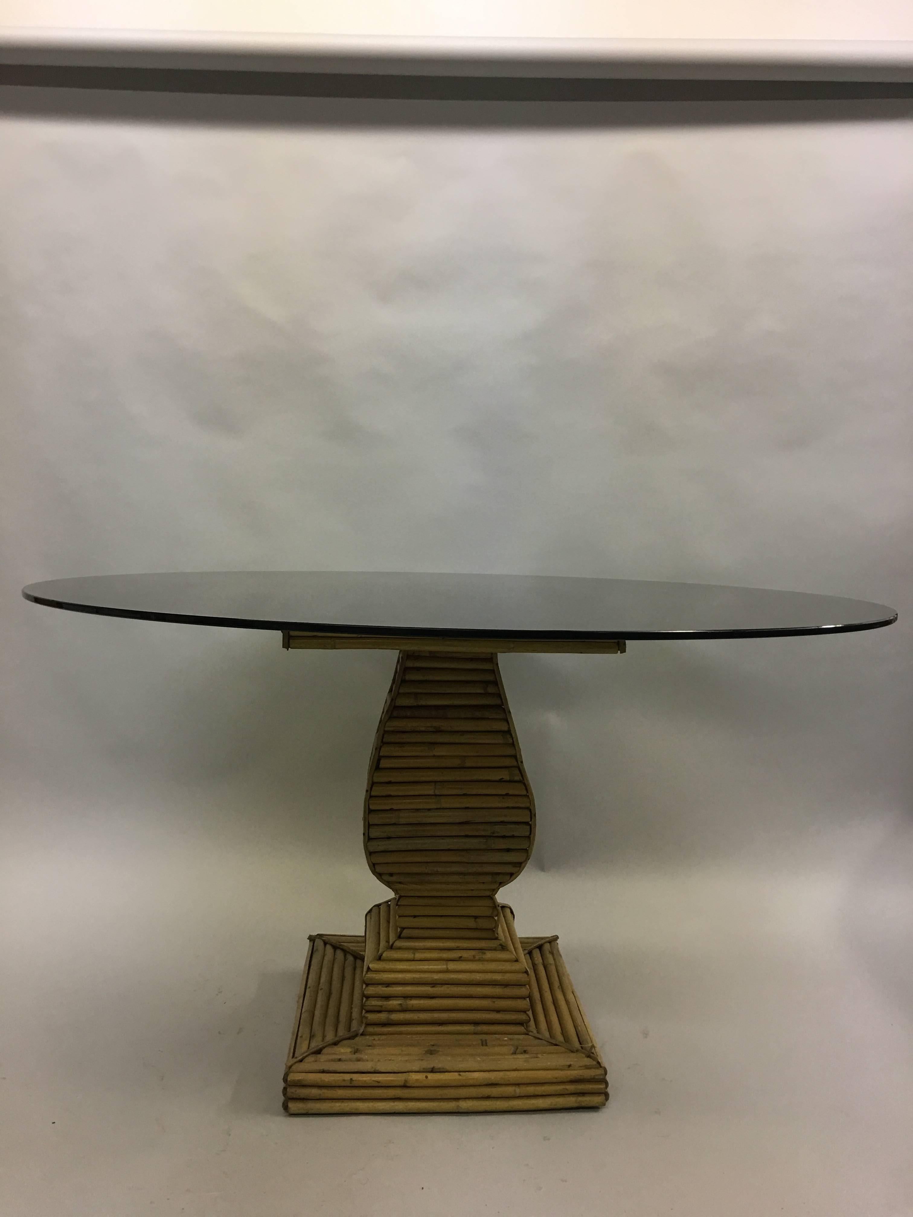 French modern neoclassical dining table base or sofa table base in rattan / bamboo by Jean-Charles Moreux, 1940. 

This table will accommodate a round or square piece of glass to form beautiful dining table. Suggested glass size can range from 48 to