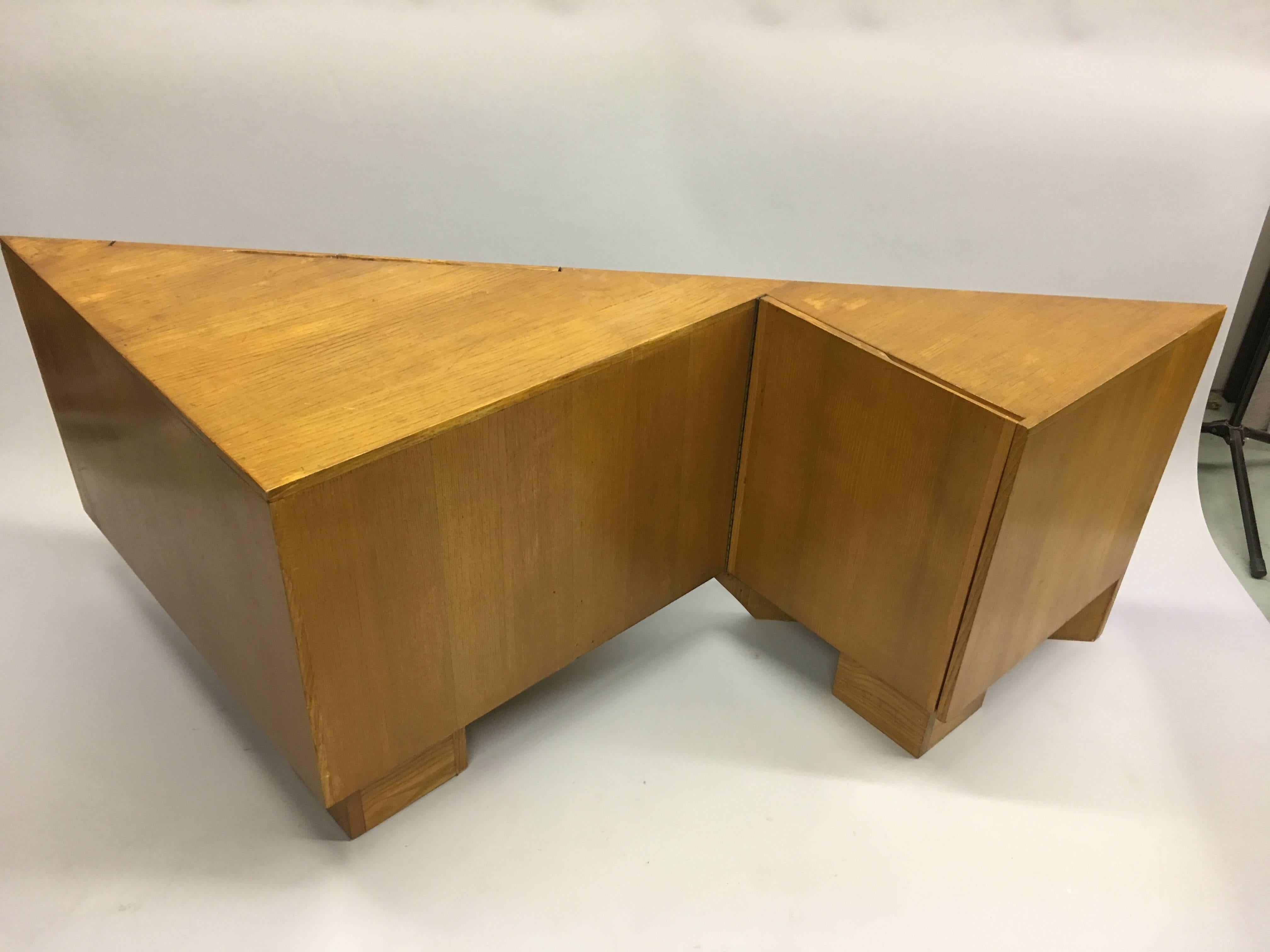 A Unique Mid-Century Modern sideboard, credenza, console or sofa table in plywood by French Modernist architect, Alain Marcoz for his own home in Paris.

The piece is a stunning work of design and architecture with the main body cantilevered over