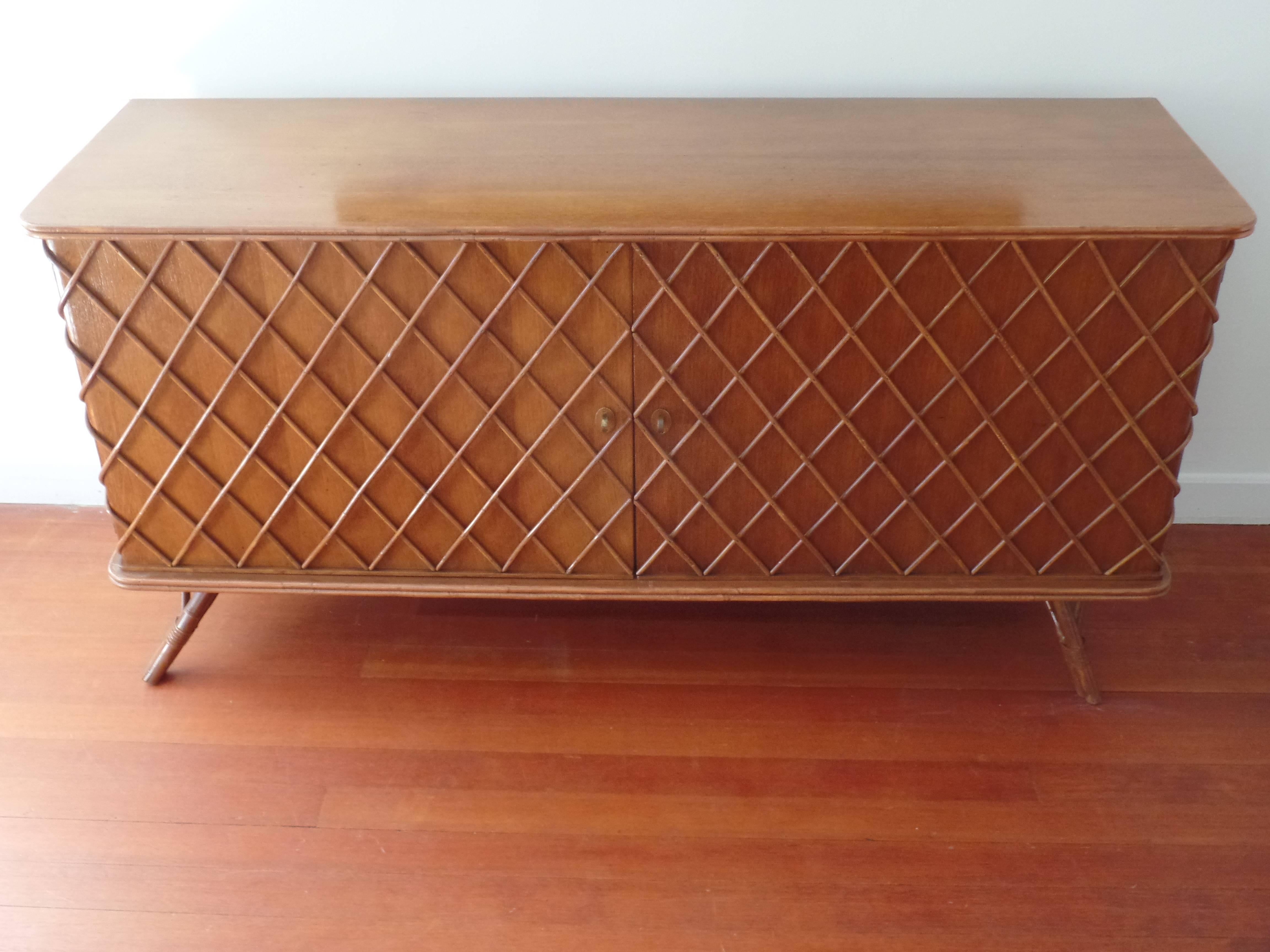 A Rare and Elegant French Mid-Century Modern Neoclassical sideboard, credenza or cabinet circa 1940-1950 attributed to Andre Arbus. The sideboard is a masterpiece of form and materials. It combines modern simplicity and purity with neoclassical