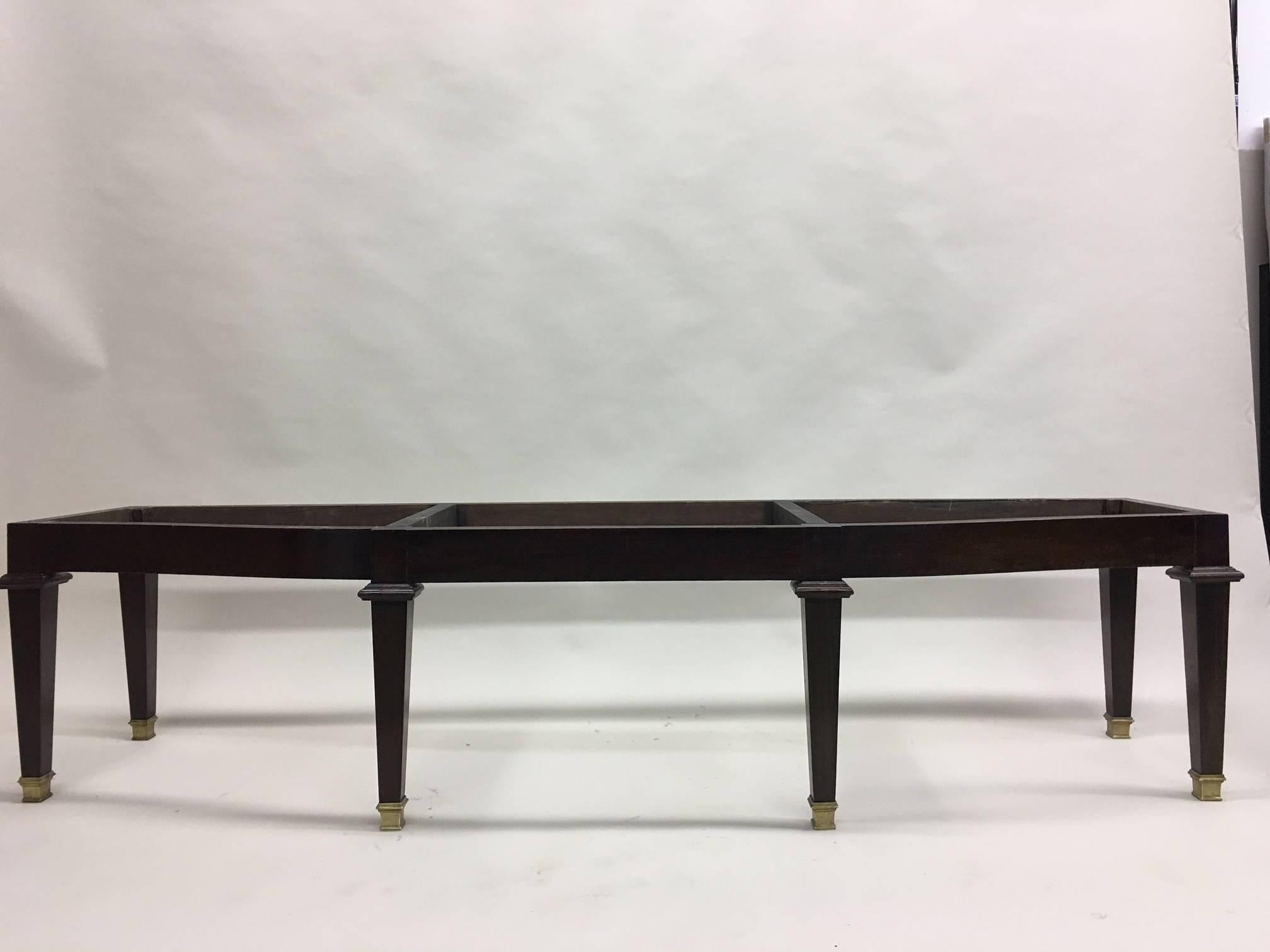 An elegant, large French Mid-Century Modern neoclassical bench attributed to the French master of 1940's interior design, Andre Arbus. The bench creates a dramatic, architectural effect with central portion bowed outwards and resting on 4 front