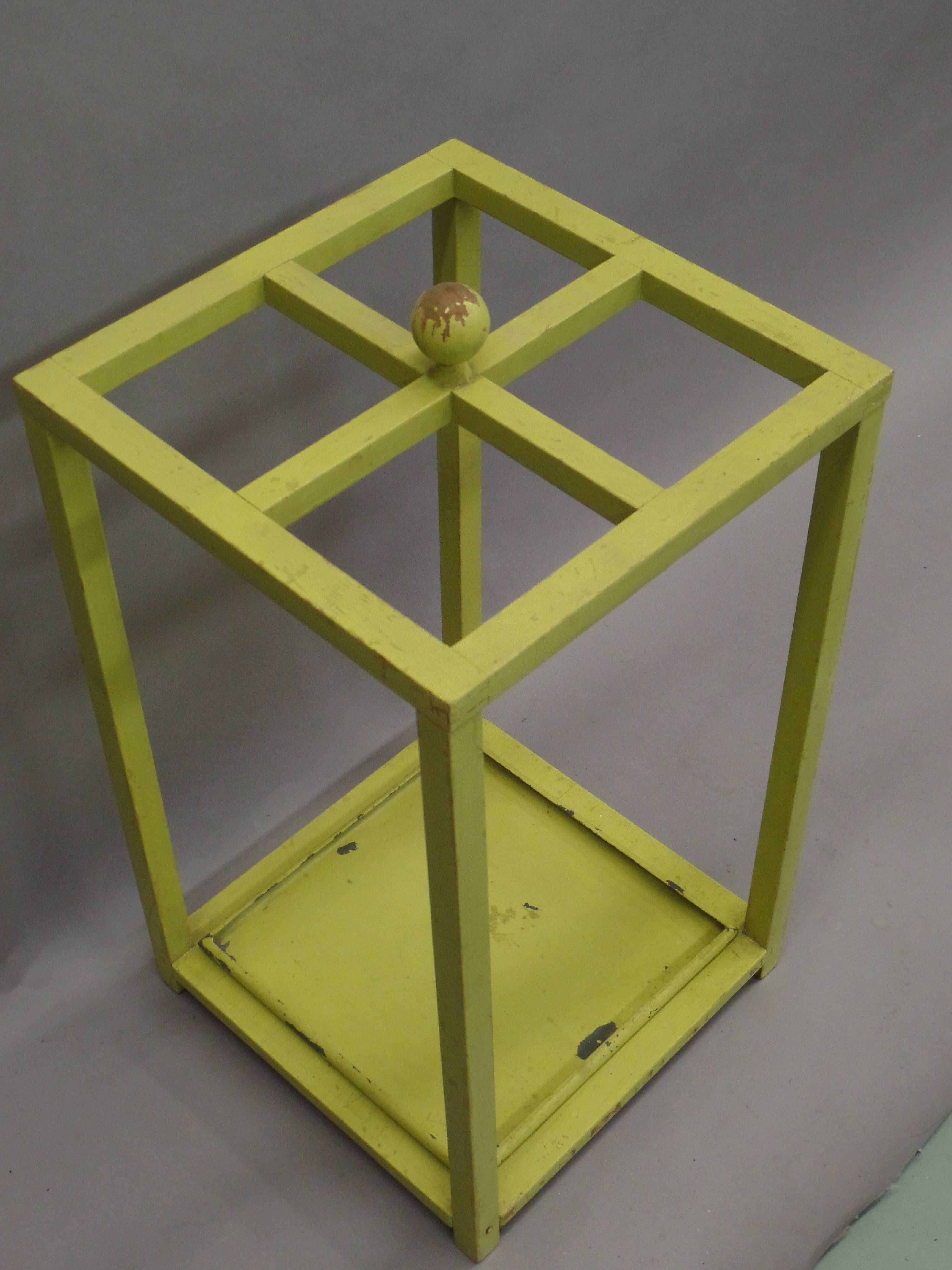 Early German modern handmade wood umbrella holder with clean, pure minimalist lines and a symmetrical grid patterned top, one can see how works like this influenced later artists such as Sol Lewit. 

Enameled in a Shade of Lime Green possibly by a