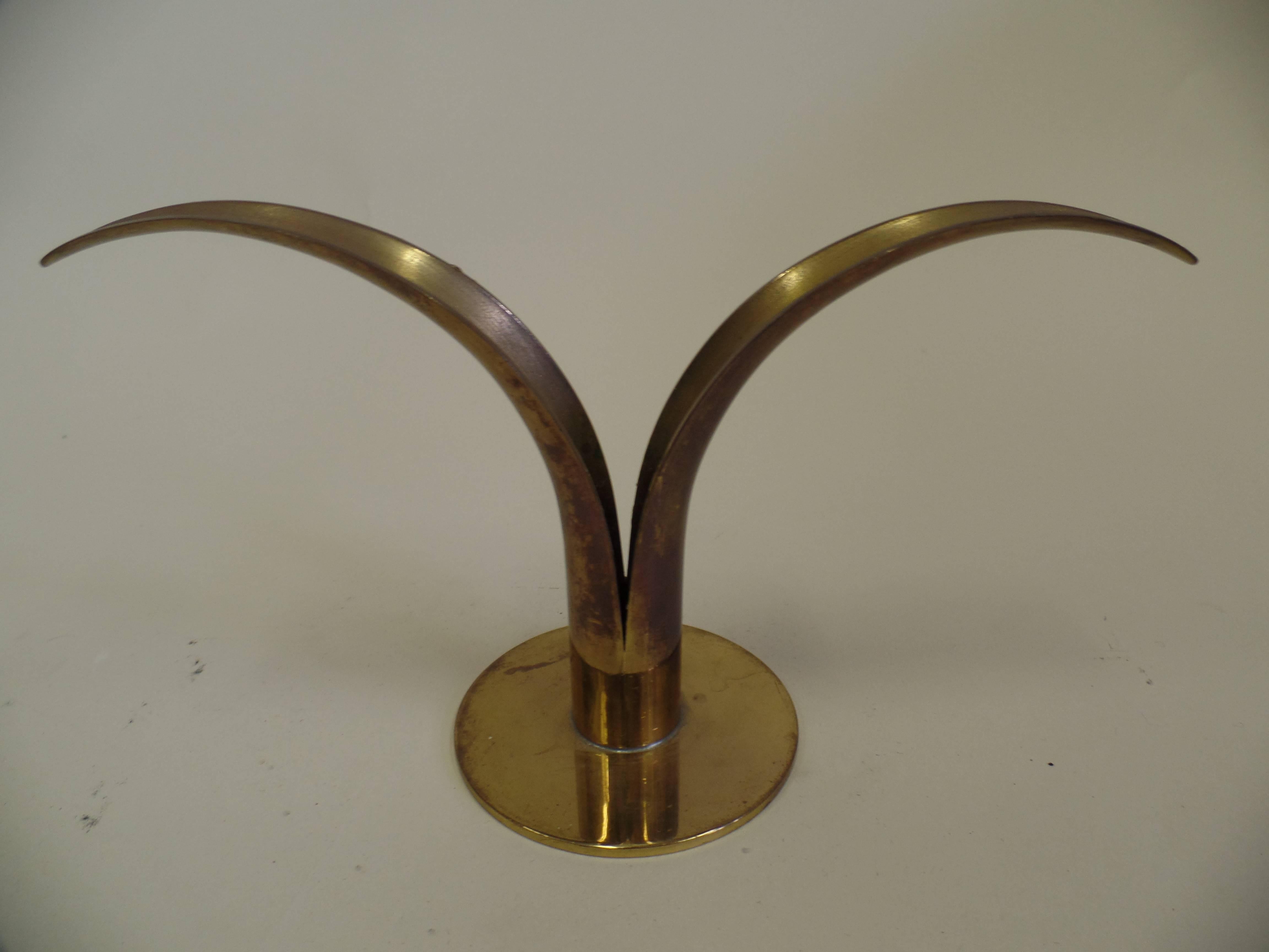 Two pairs of Scandinavian Mid-Century Modern solid brass candlesticks/bud vases by Ystad Metall. 

Priced and sold by the individual piece.