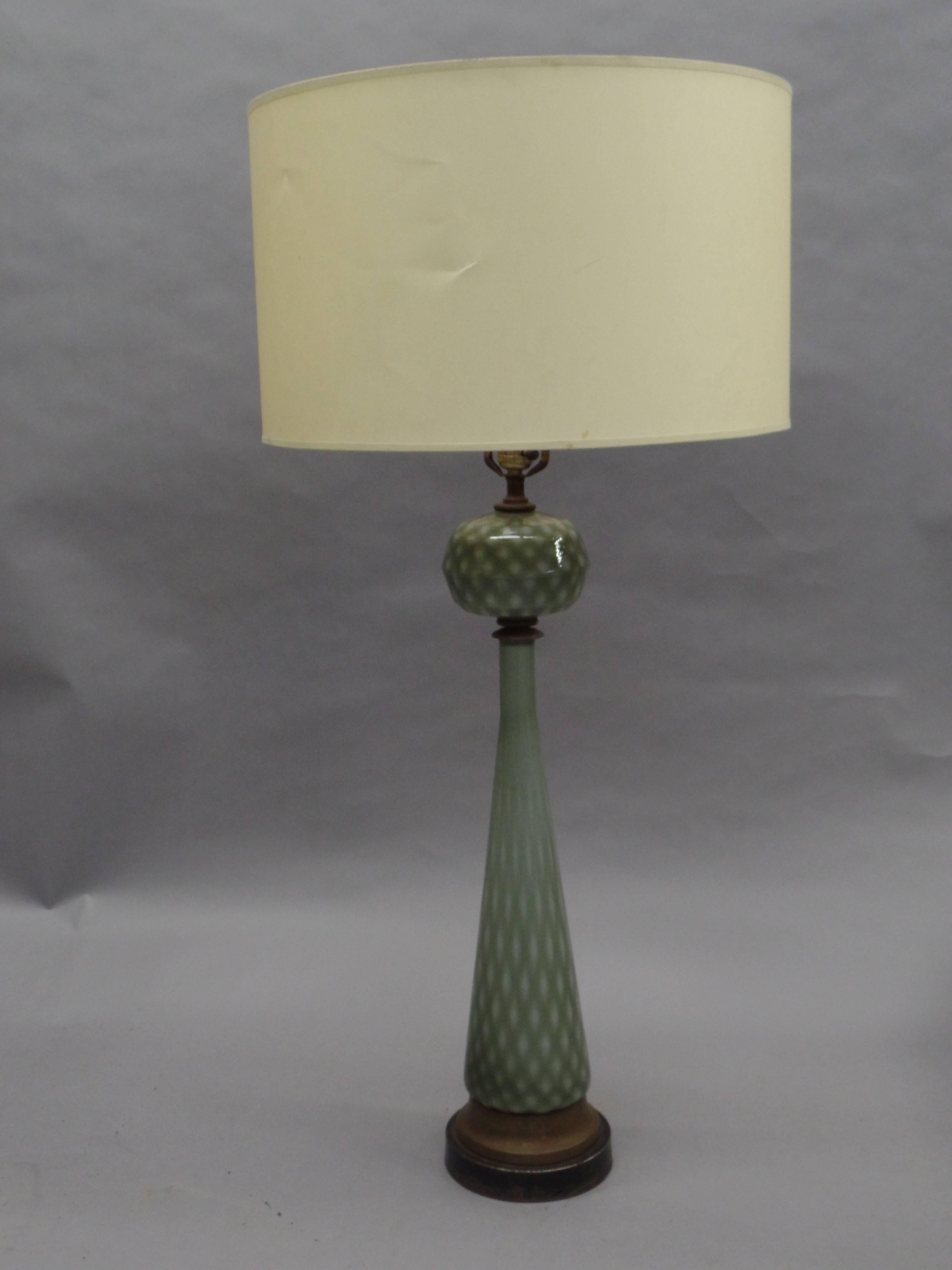 Pair of rare Italian Mid-Century handblown Venetian glass table lamps attributed to Barovier e Toso. Their unusual form has both a modern and neoclassical appeal.

Height shown is 43