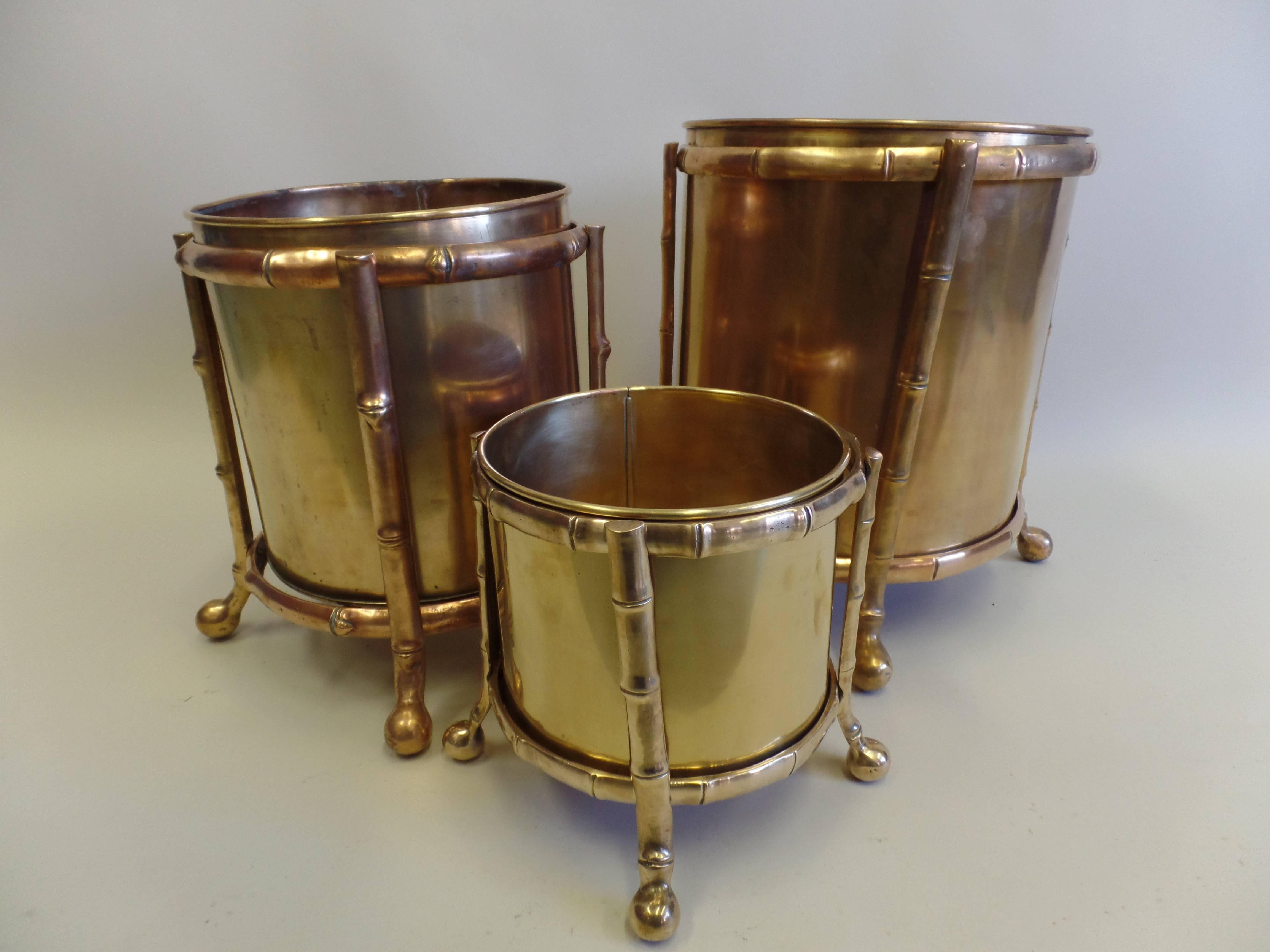 Three Rare French Mid-Century Modern Neoclassical bronze and brass umbrella stands / waste baskets by Maison Baguès. 

The pieces are composed of a delicately cast bronze frames with removable bronze baskets / cans set into the frames. The pieces
