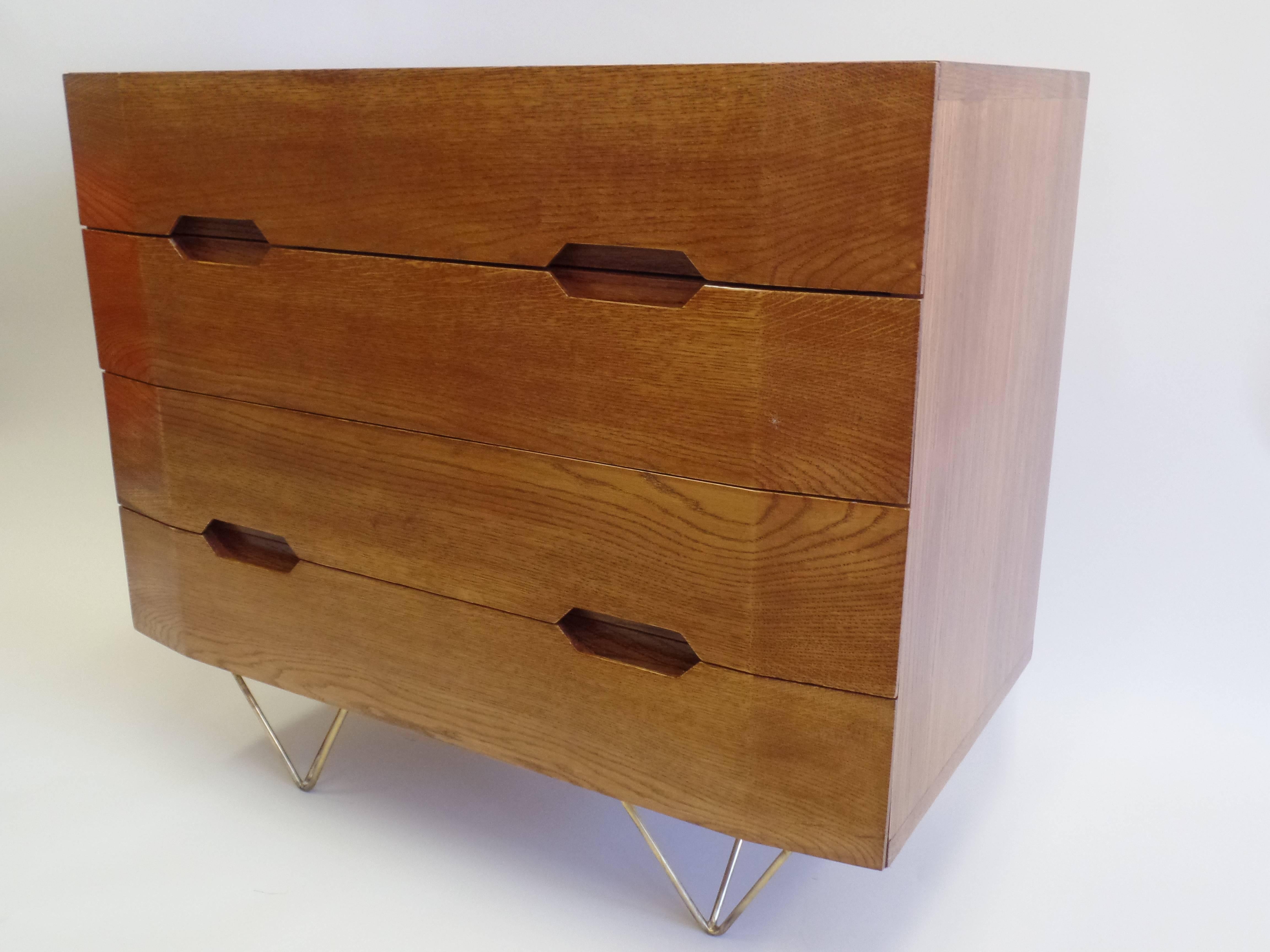 2 Italian Mid-Century Modern chests of drawers / dressers or commodes from the circle of Gio Ponti. Priced and sold individually.

The pieces are a mixture of exquisite form and subtle volumes suspended on tapered transparent brass tripod legs.