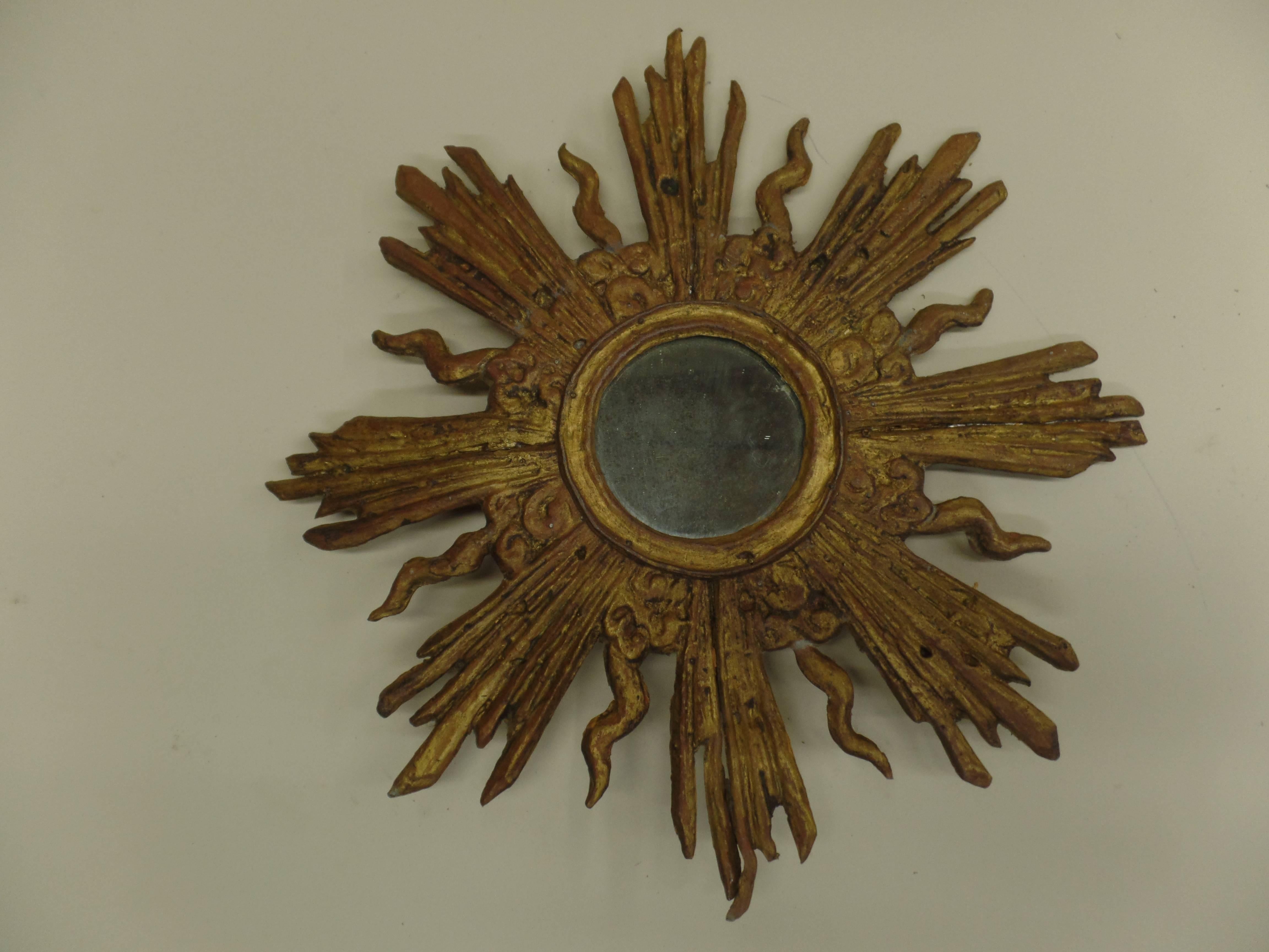 Rare French Modern Neoclassical, Louis XIV Style sunburst wall mirror composed of gilt lead attributed to Maison Jansen. 

