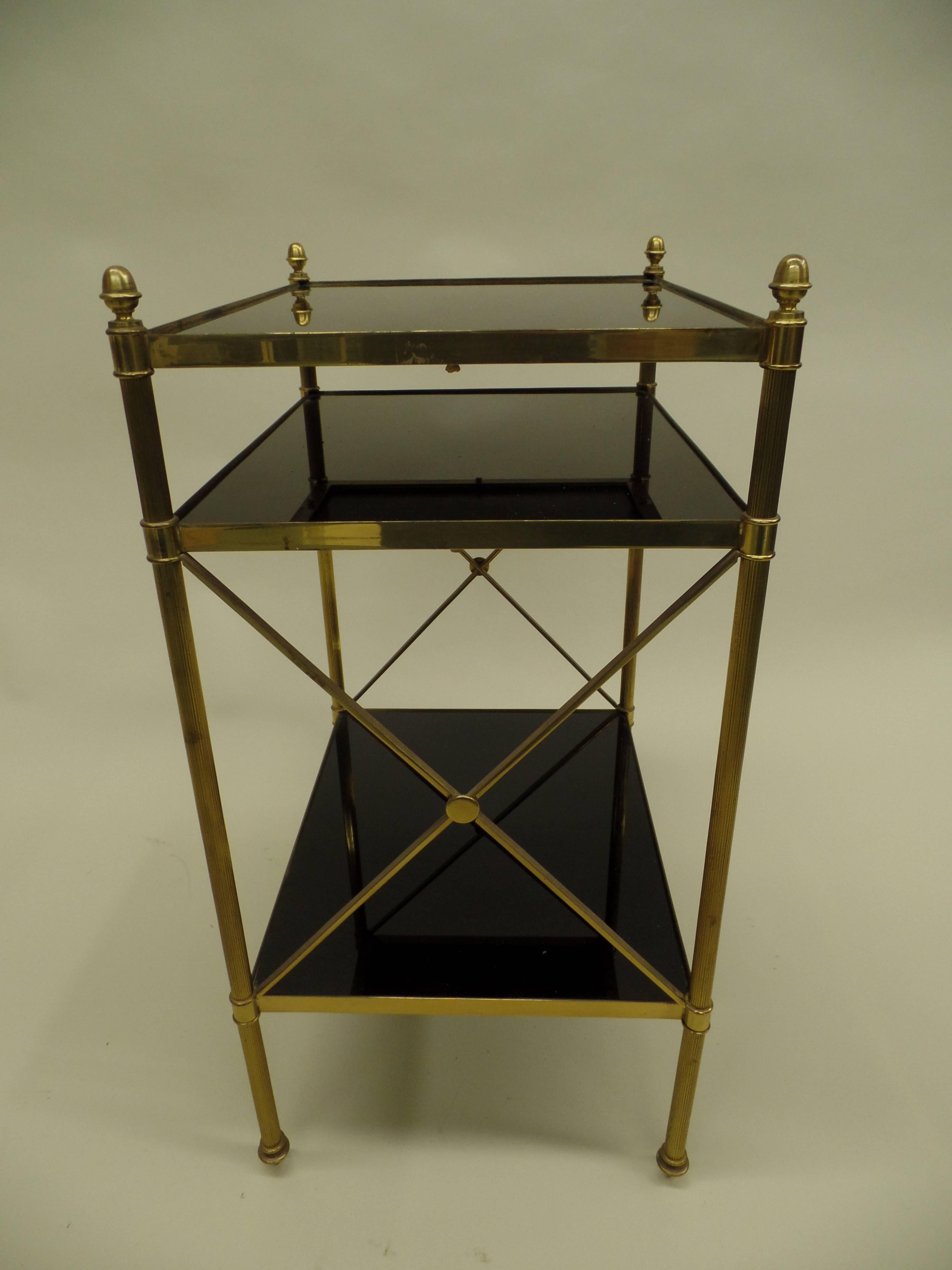 Mid-Century Modern Pair of French Brass and Black Onyx X-Frame Side Tables by Maison Jansen