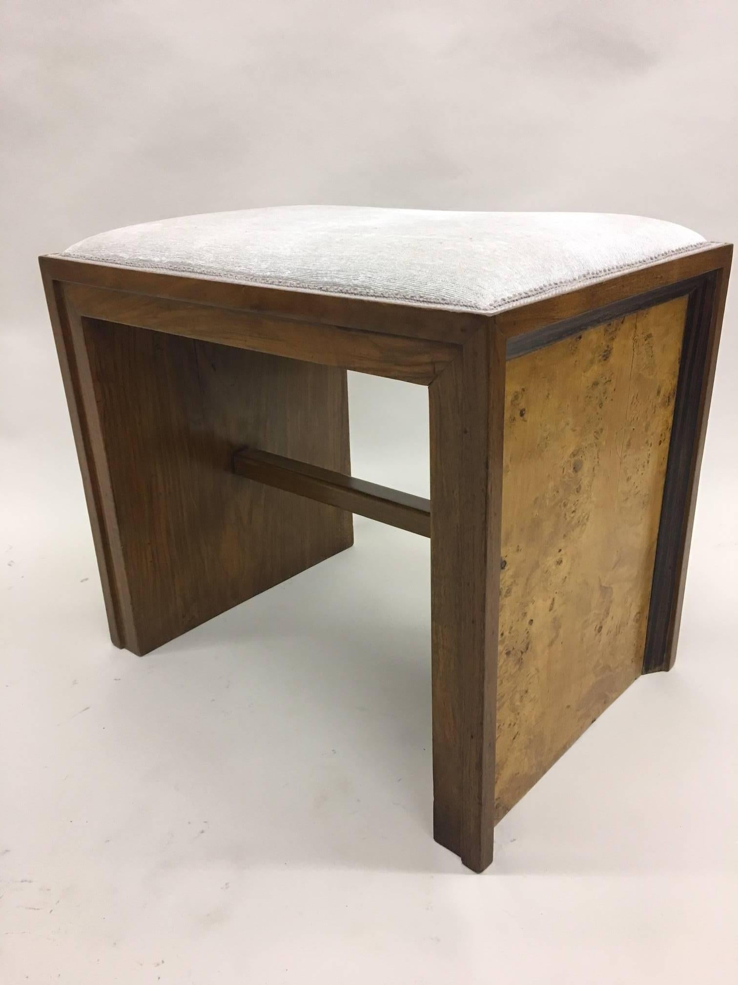 Elegant pair of Italian Mid-Century benches or stools by a Italian Rationalist architect, circa 1930. The pieces feature a sober rectangular design but are countered with an elegant combination of various woods including white birch, elm and
