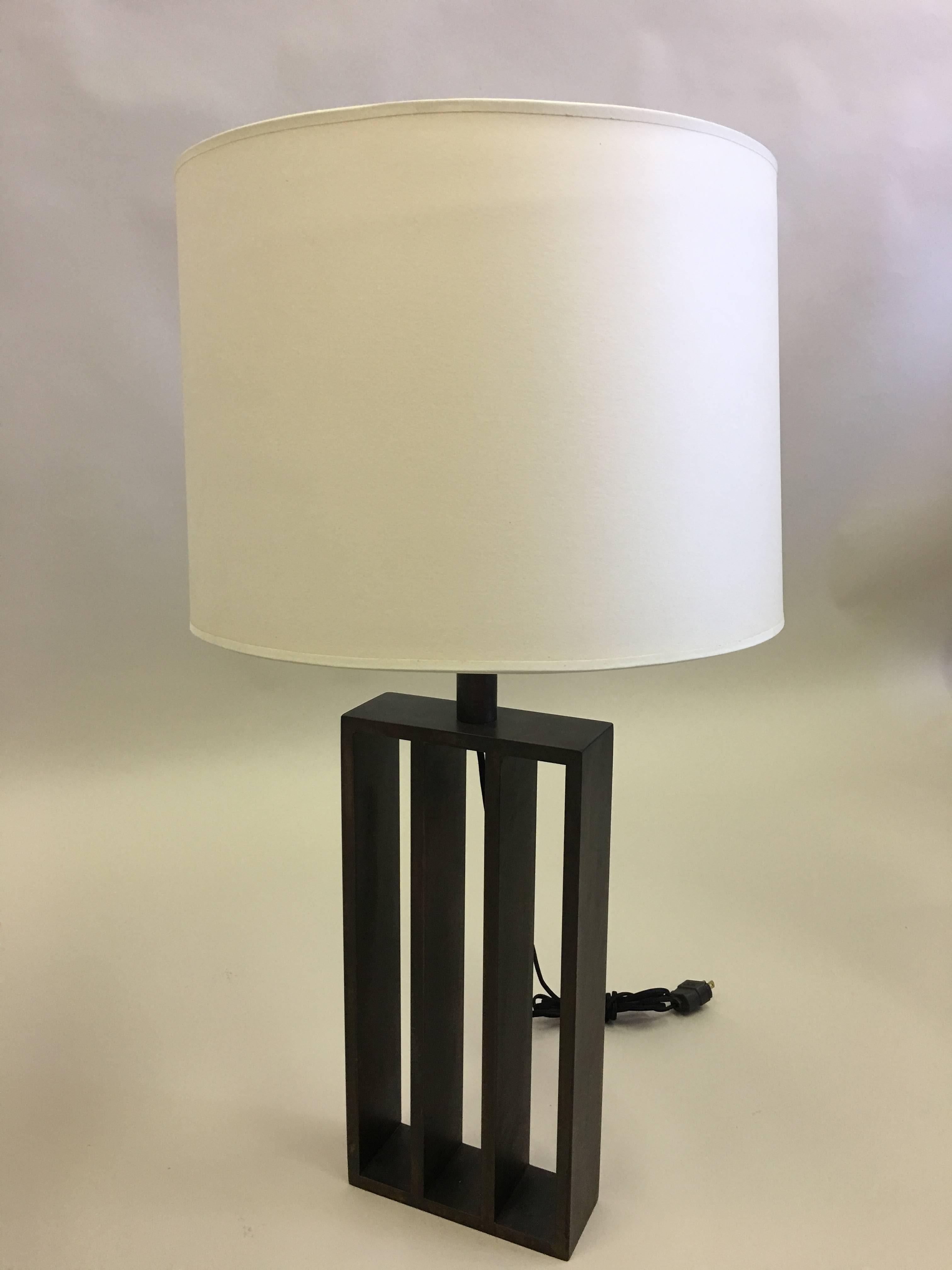 Pair of French Mid-Century Modern style wrought iron table lamps in the Minimalist tradition by Thomas Gargiulo inspired by the work of French architect or designer, Jacques Quinet and the American artist, Sol Le Witt.

The dimensions of the base