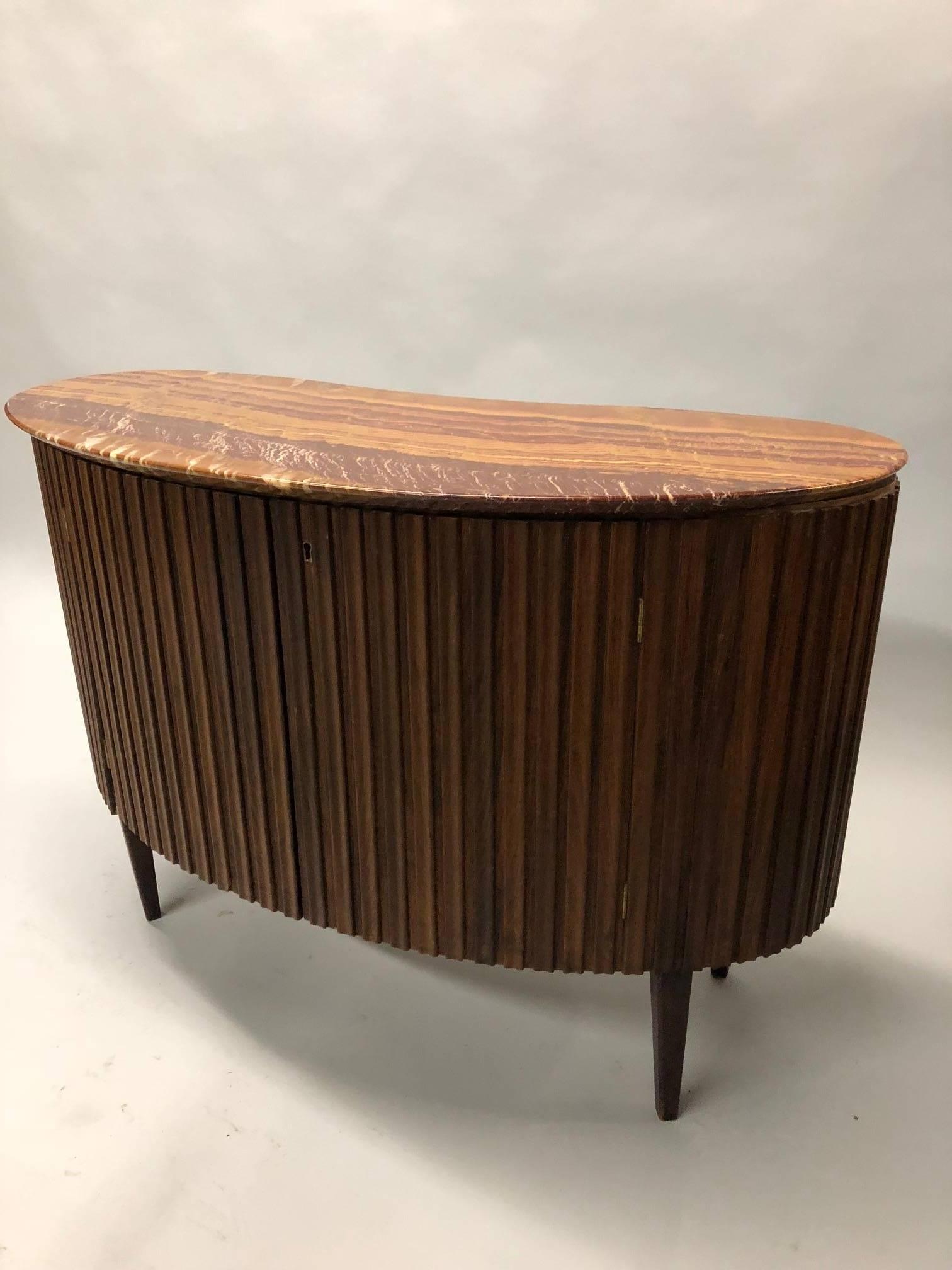 An Elegant, Timeless and Enchanting Italian Mid-Century Modern Neoclassical cabinet / bar / sideboard / credenza / console / sofa table by Paolo Buffa, circa 1950. 

The cabinet / console is unique with its sensuous, subtle organic form simulating