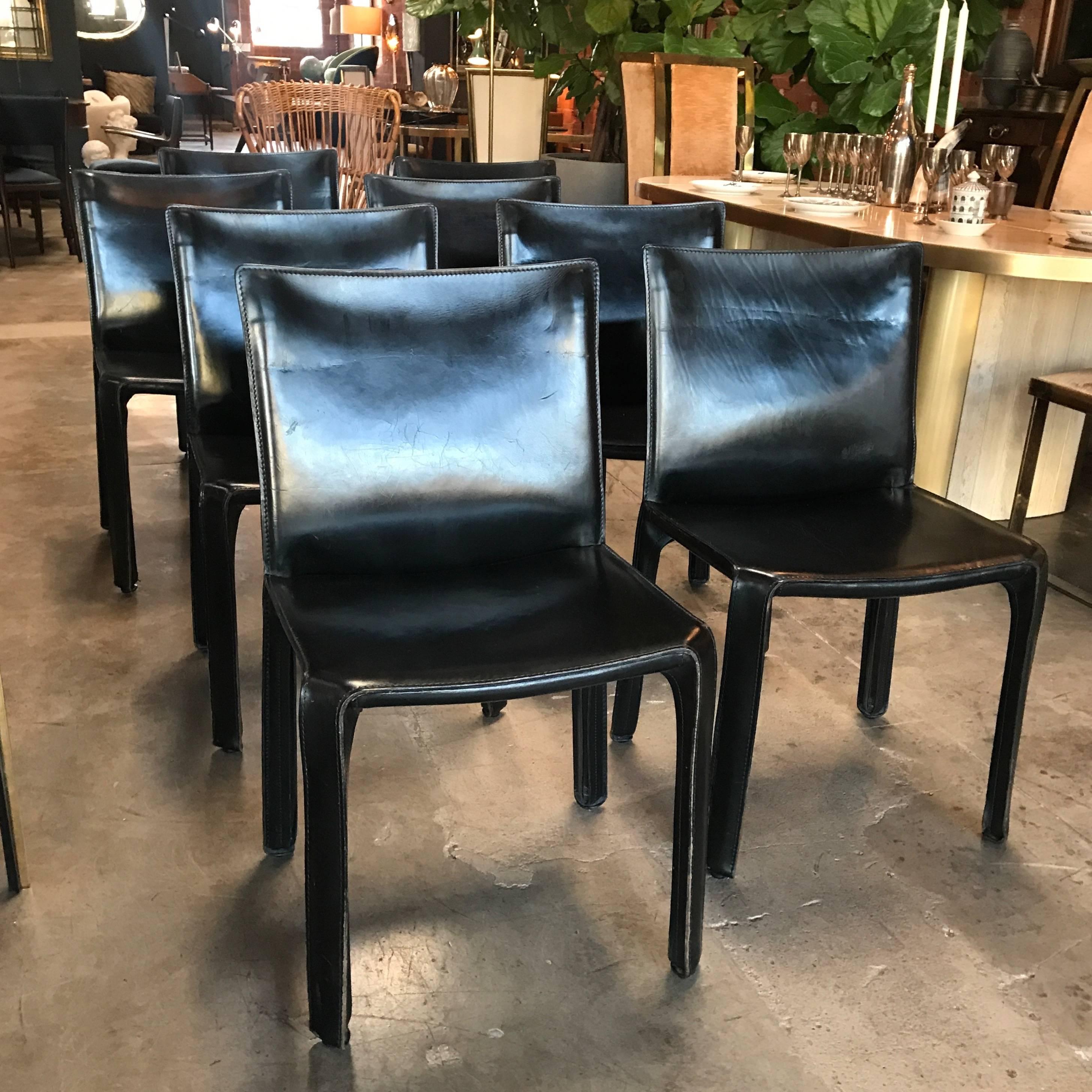 Cassina chairs, model cab nr. 412 by Mario Bellini in black leather. Set of eight.
The cab chair was conceived by the architect and designer Mario Bellini in 1977. Cassina produced a skeleton in tubular steel and stretched leather which is then