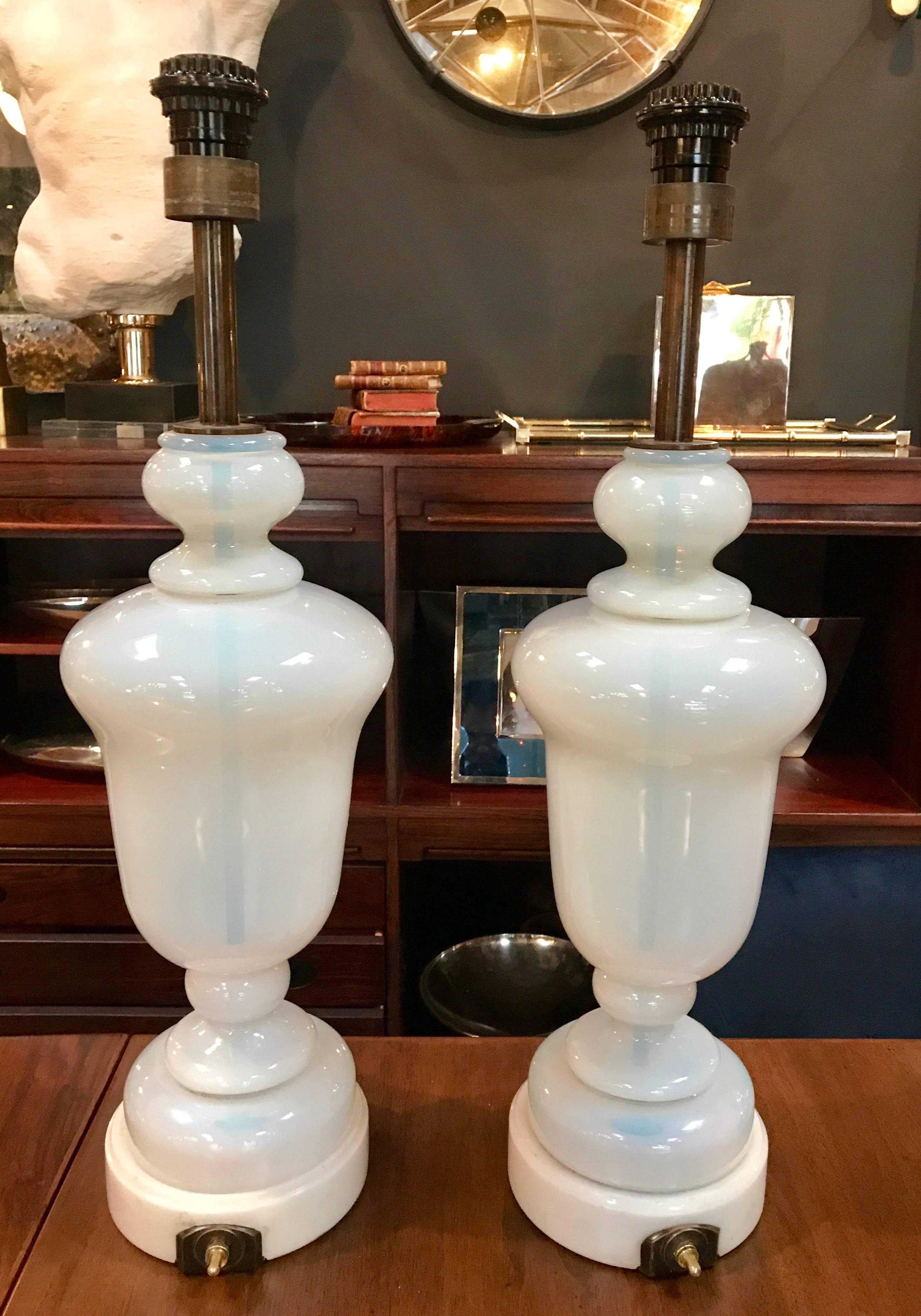 Pair of Seguso Murano glass lamps with Carrara marble base.
Rewire.