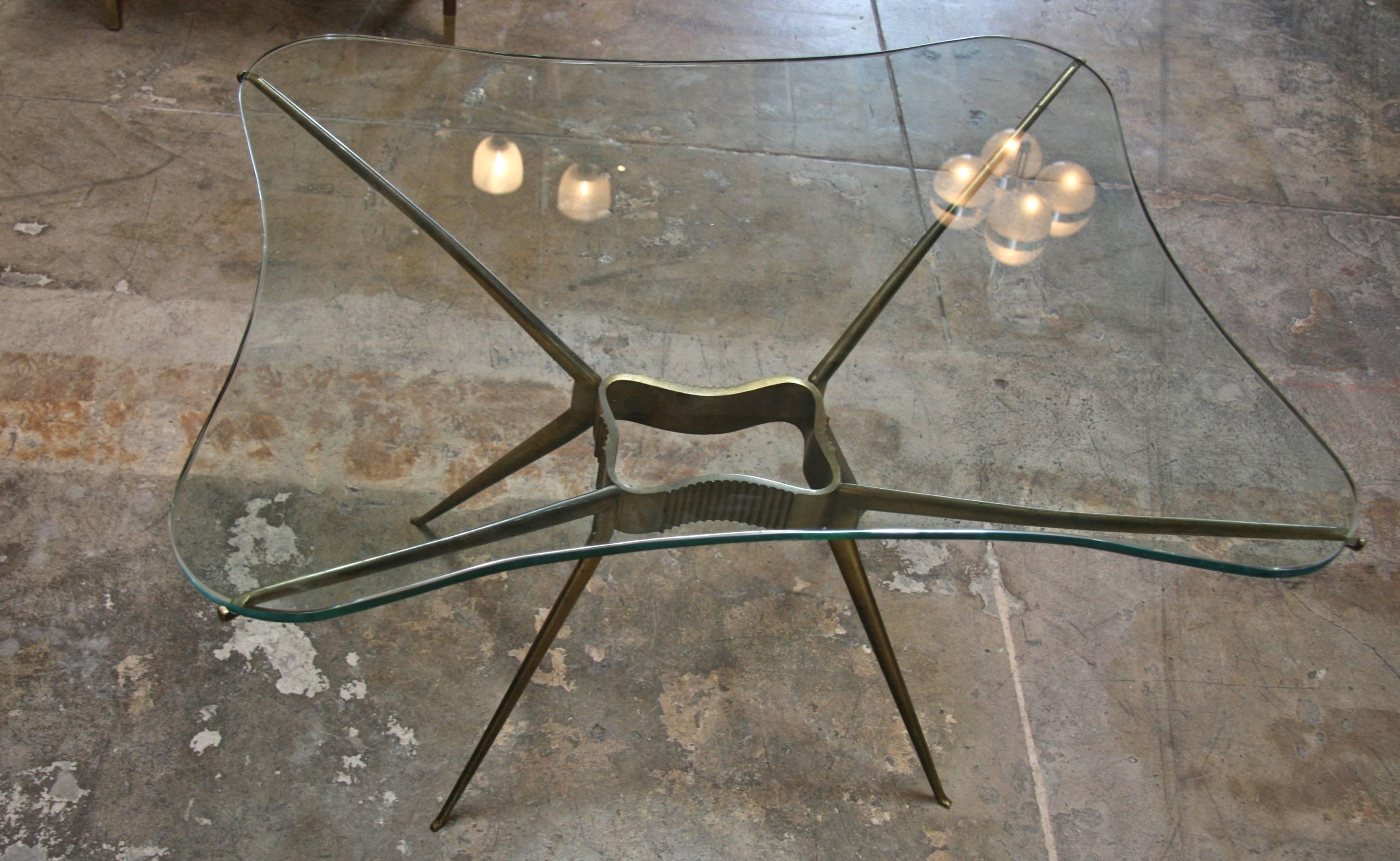 Italian 1950s brass cocktail table. This delicate design stands the test of time.