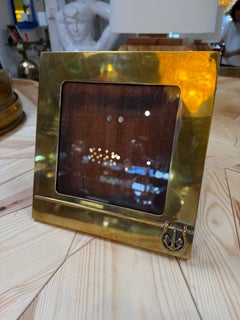 Cornice vintage Gucci in ottone con emblema equestre