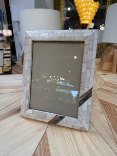 Cornice a mosaico con dettagli turchesi