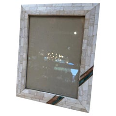 Cornice a mosaico con dettagli turchesi