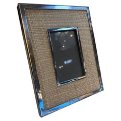 Cornice per foto in rattan intrecciato color argento