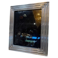 Cornice a gradini color argento