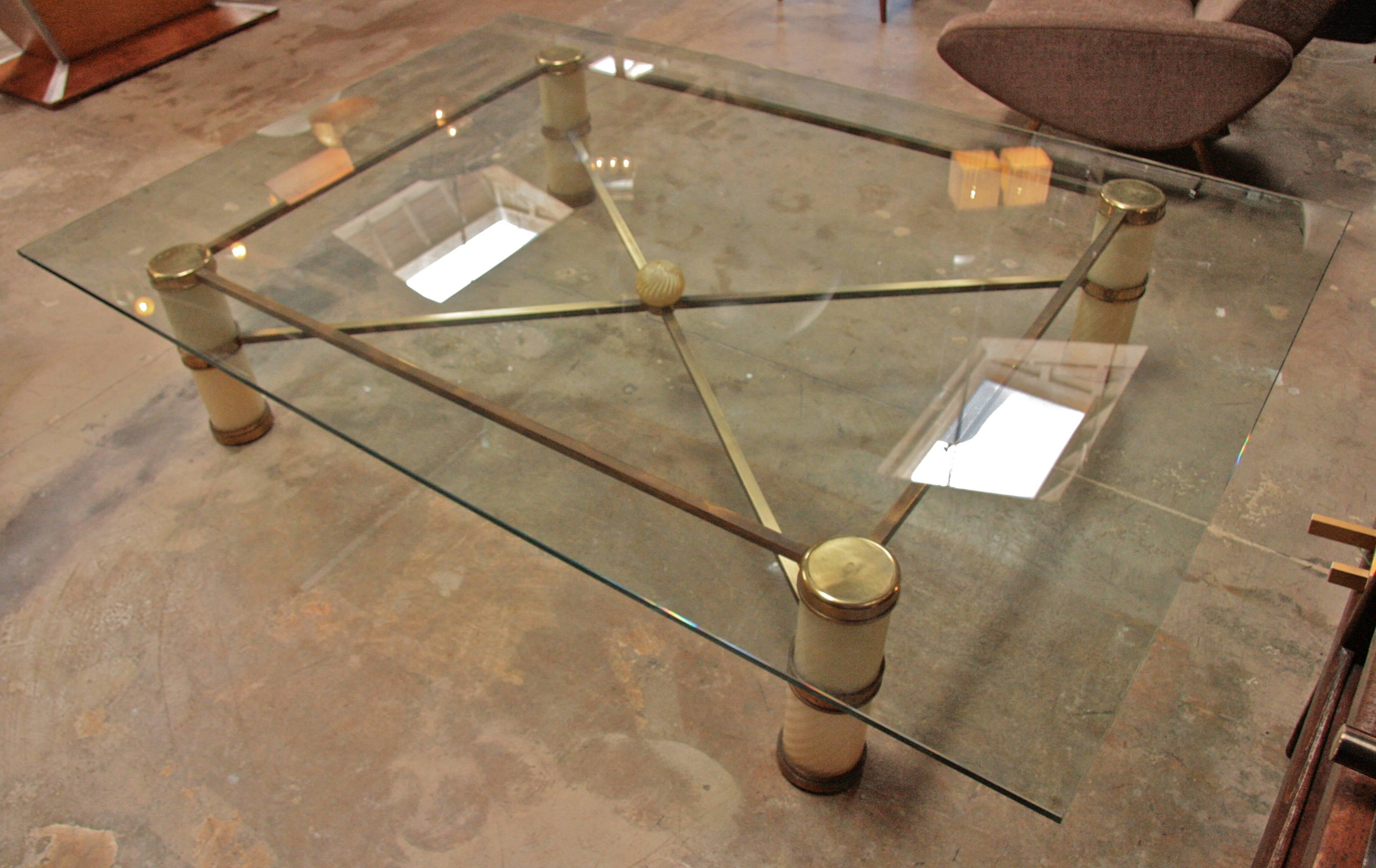 Giant coffee table by Tommaso Barbi with Spiral Murano glass and brass.
Gorgeous base. They don't make'm like this anymore.