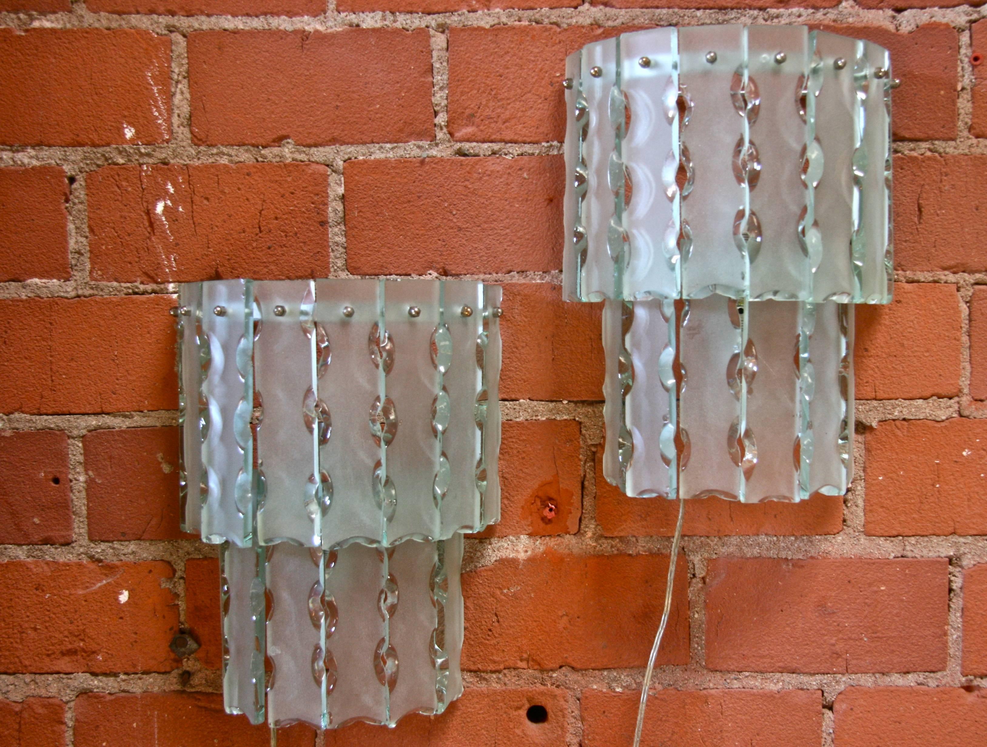 Pair of Italian beveled glass sconces by Cristal Art.