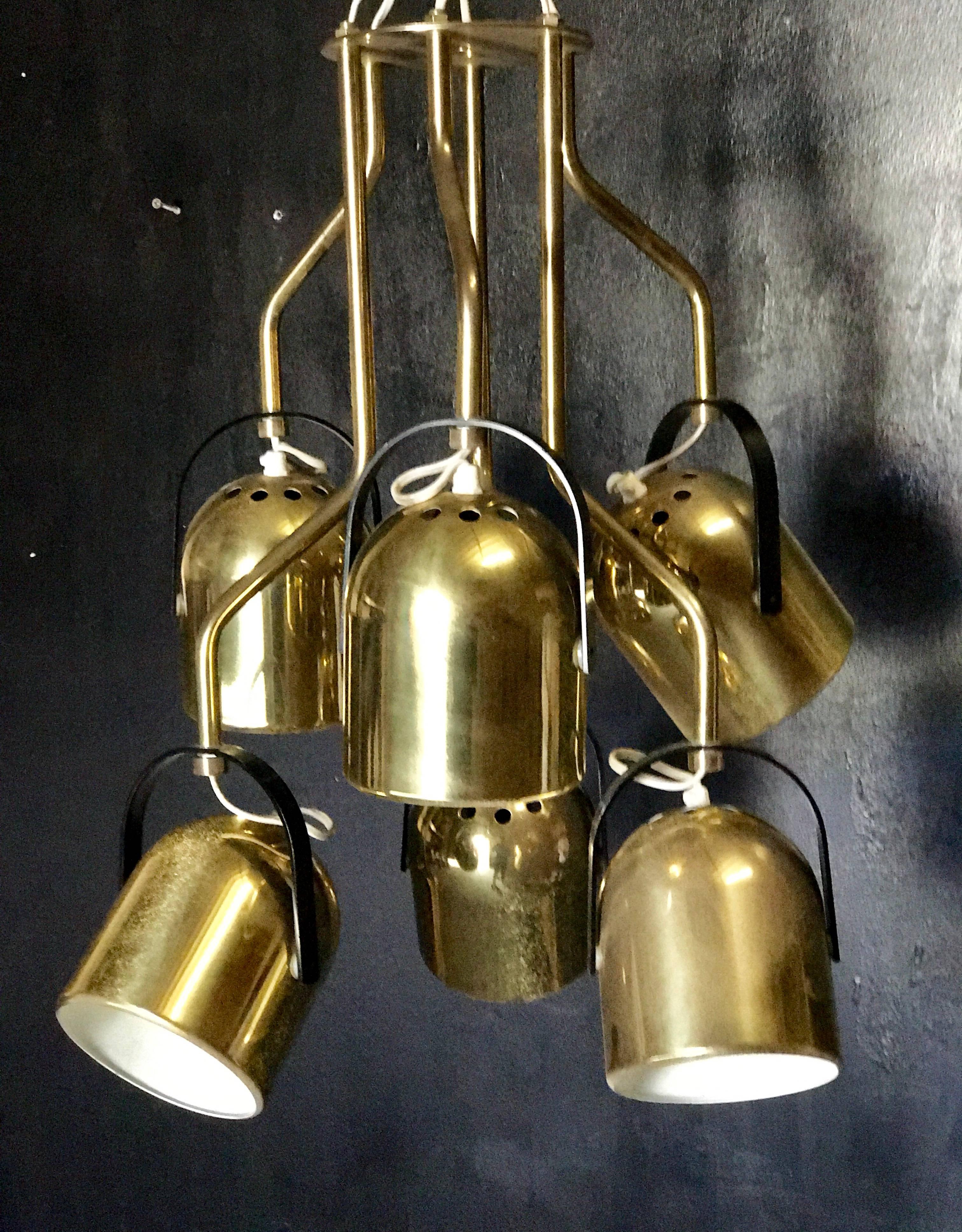 Italian 1970s brass pendant light
Six arms, six lights.