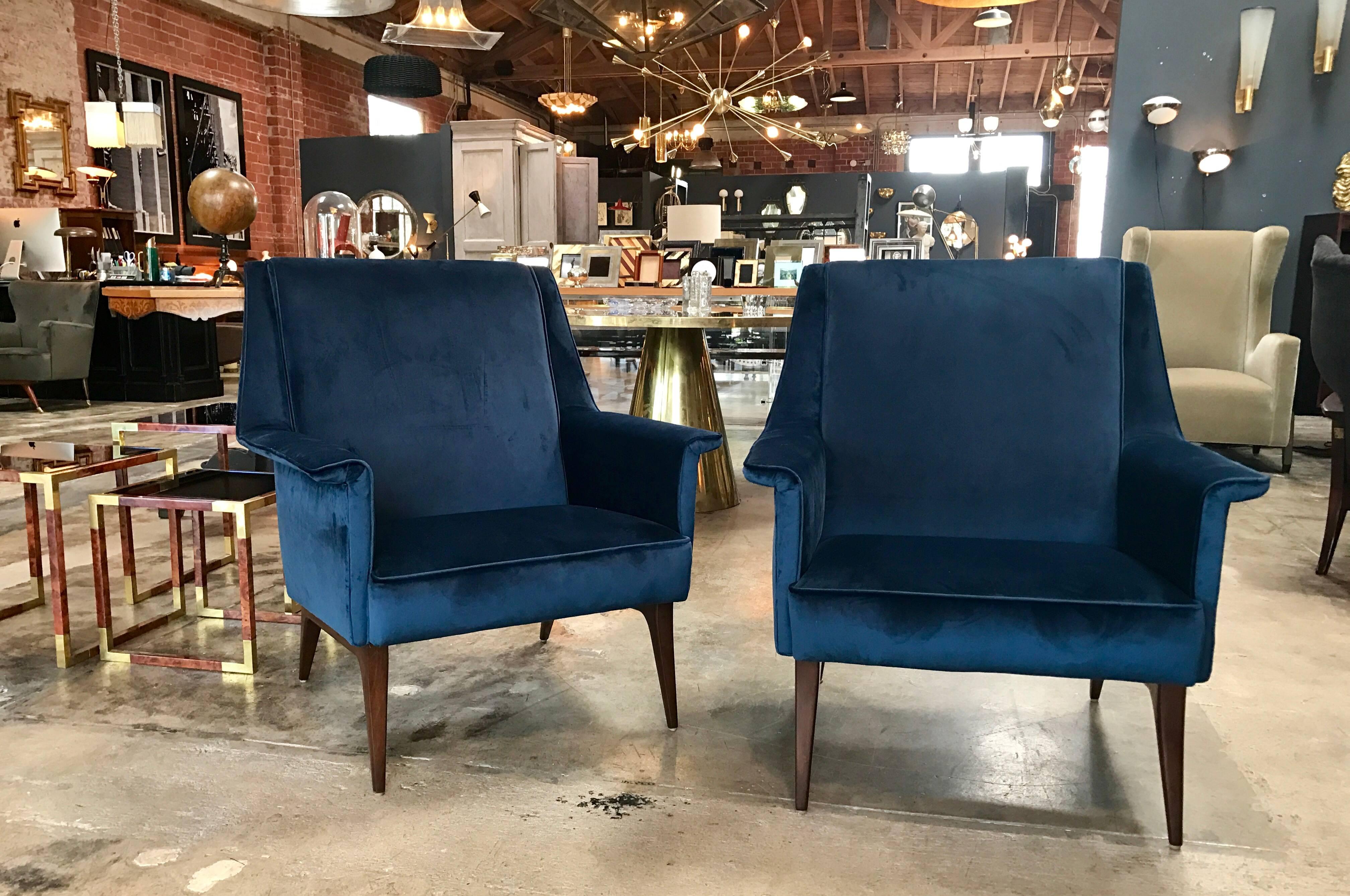 Super sexy savvy Italian 1960s pair of blue armchairs.