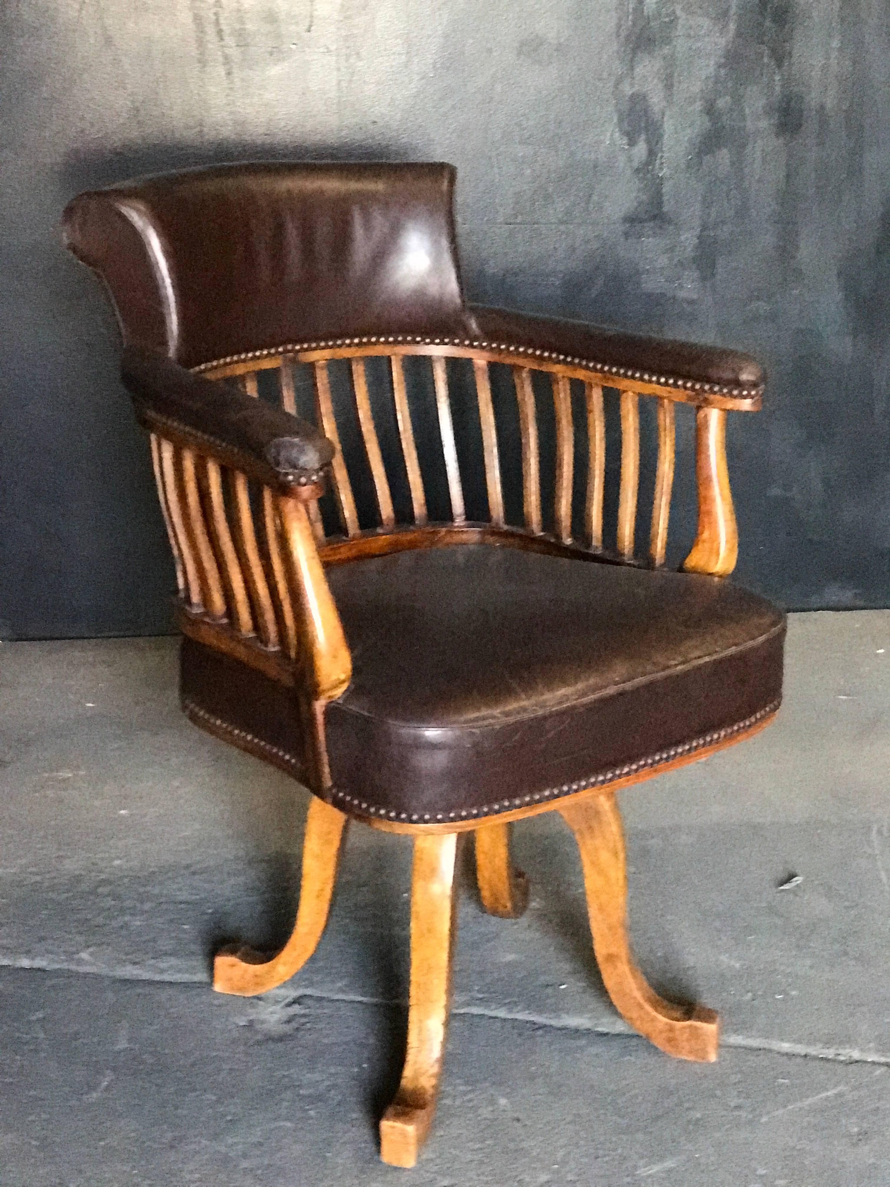 French 19th century walnut and leather swivel office chair.