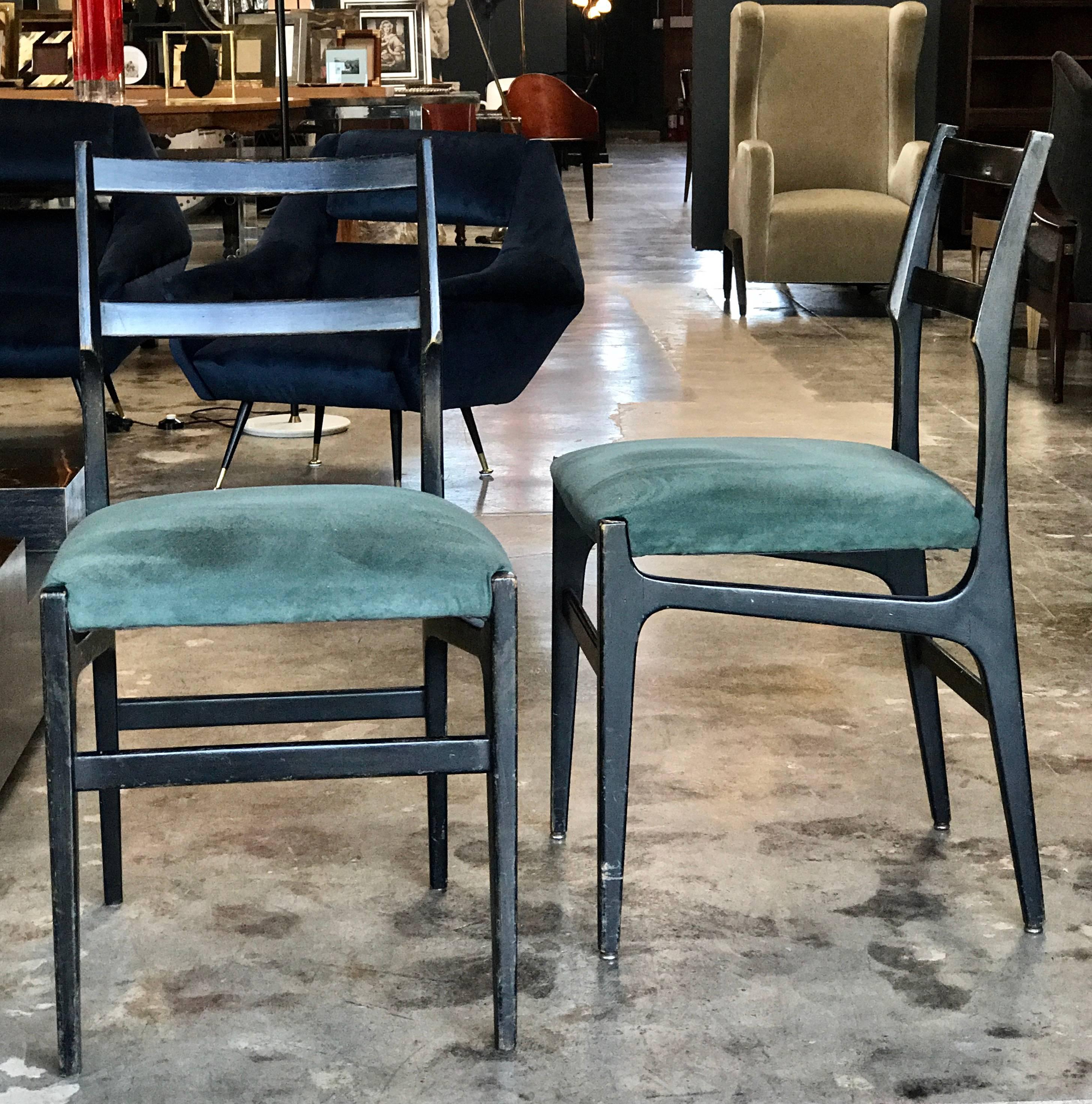 Pair of Gio Ponti leggera dining chairs with original fabric.