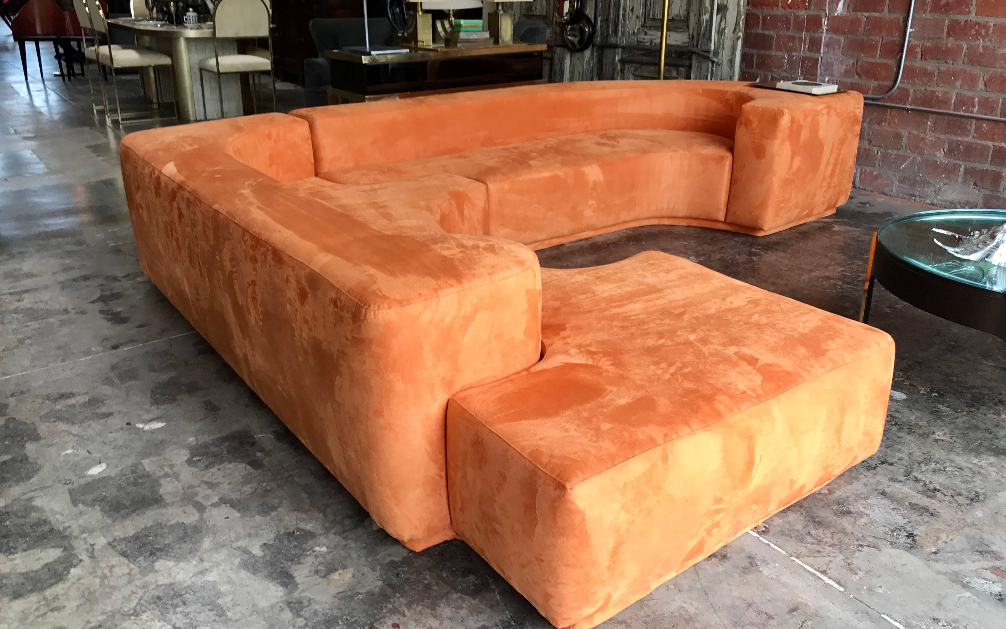 This well designed sofa is comprised of two interlocking sections with a tight seat and back. The sectional was designed in 1958 but produced in 1968.
It has been reupholstered in suede.
 