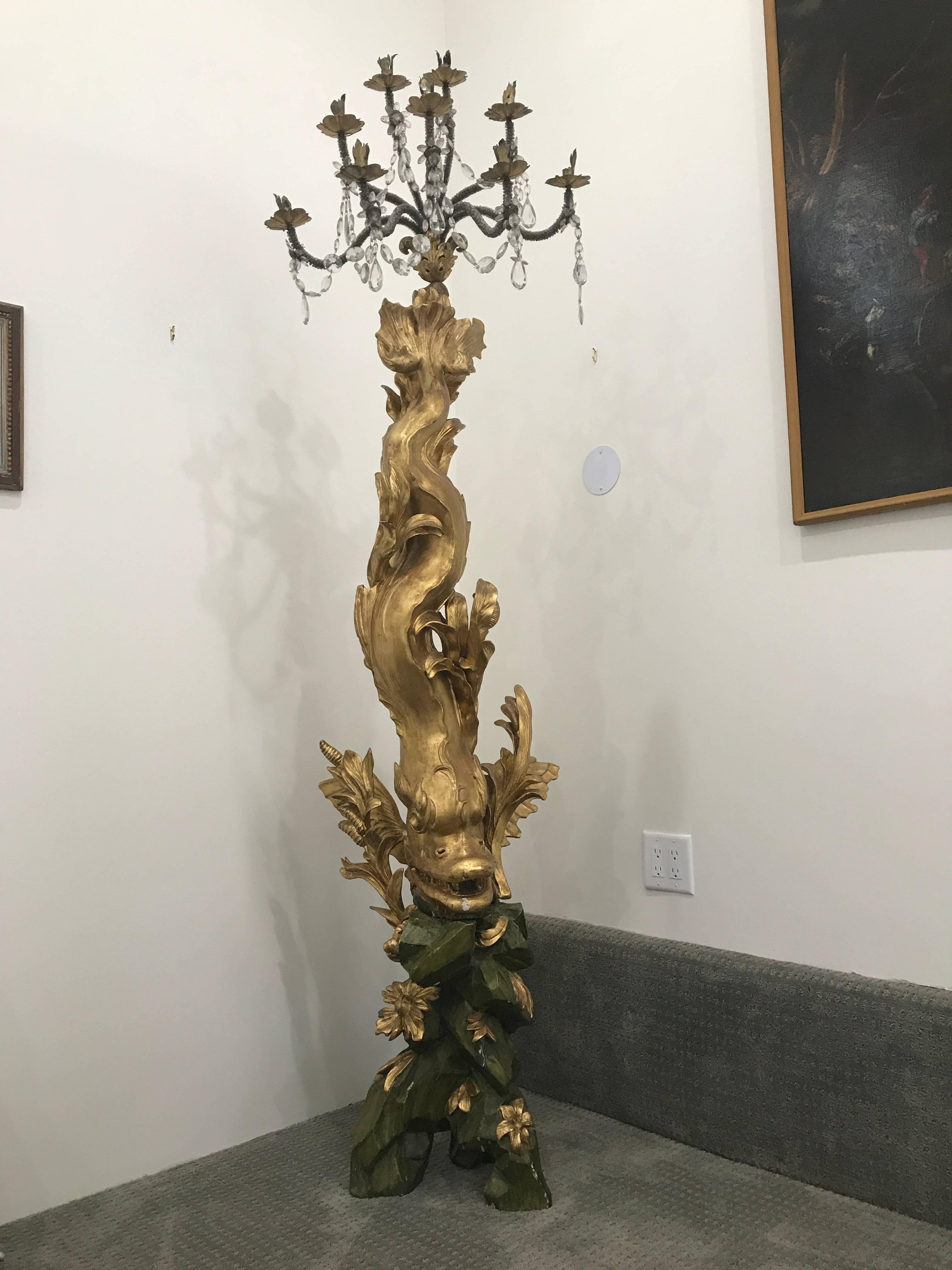 Pair of magnificent 17th century candelabra by Domenico Parodi (1672-1742) with "Certificate of Authenticity."
Triton design with sculpted wood, gilded and painted. Embellished with crystals.