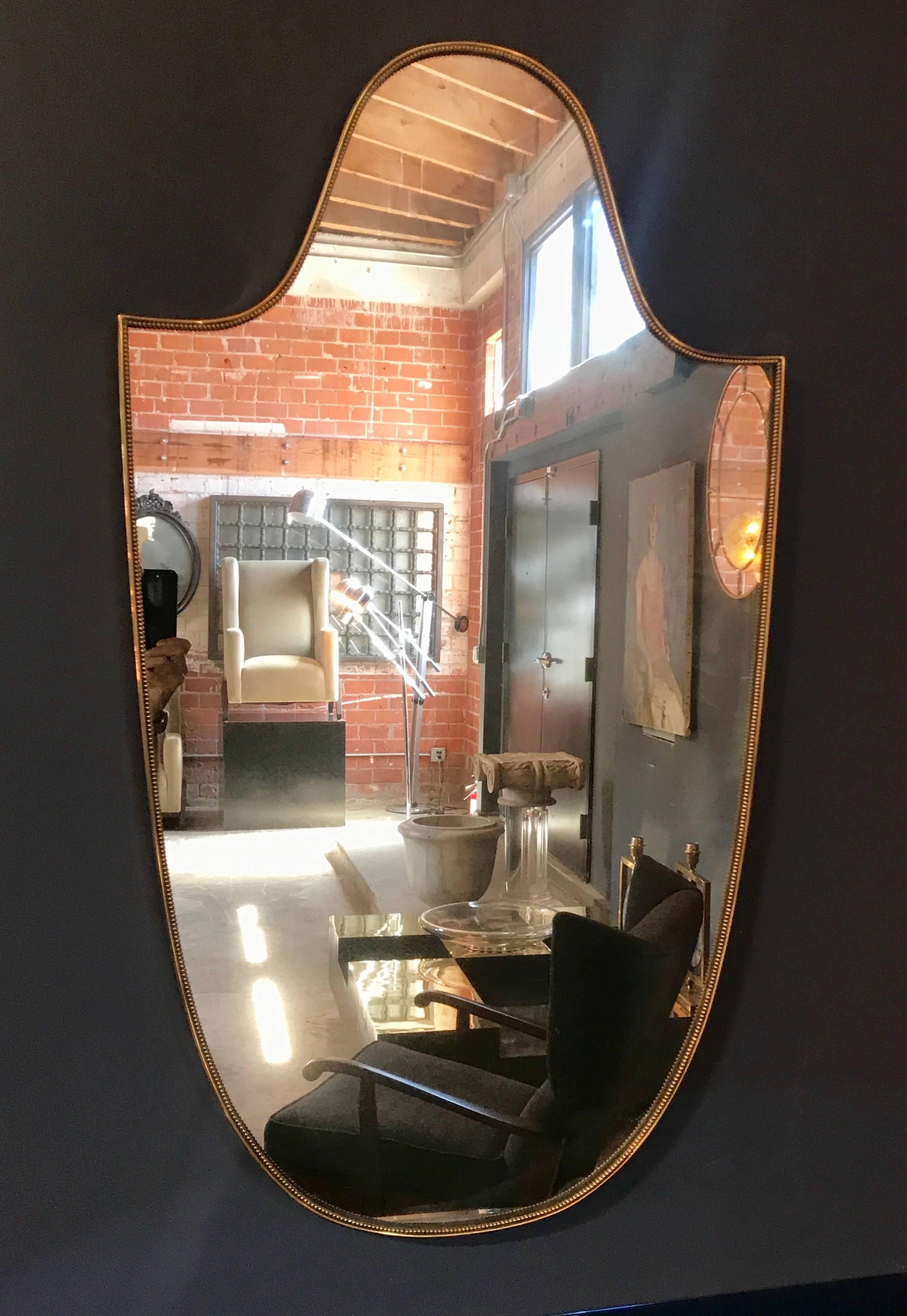 long brass mirror
