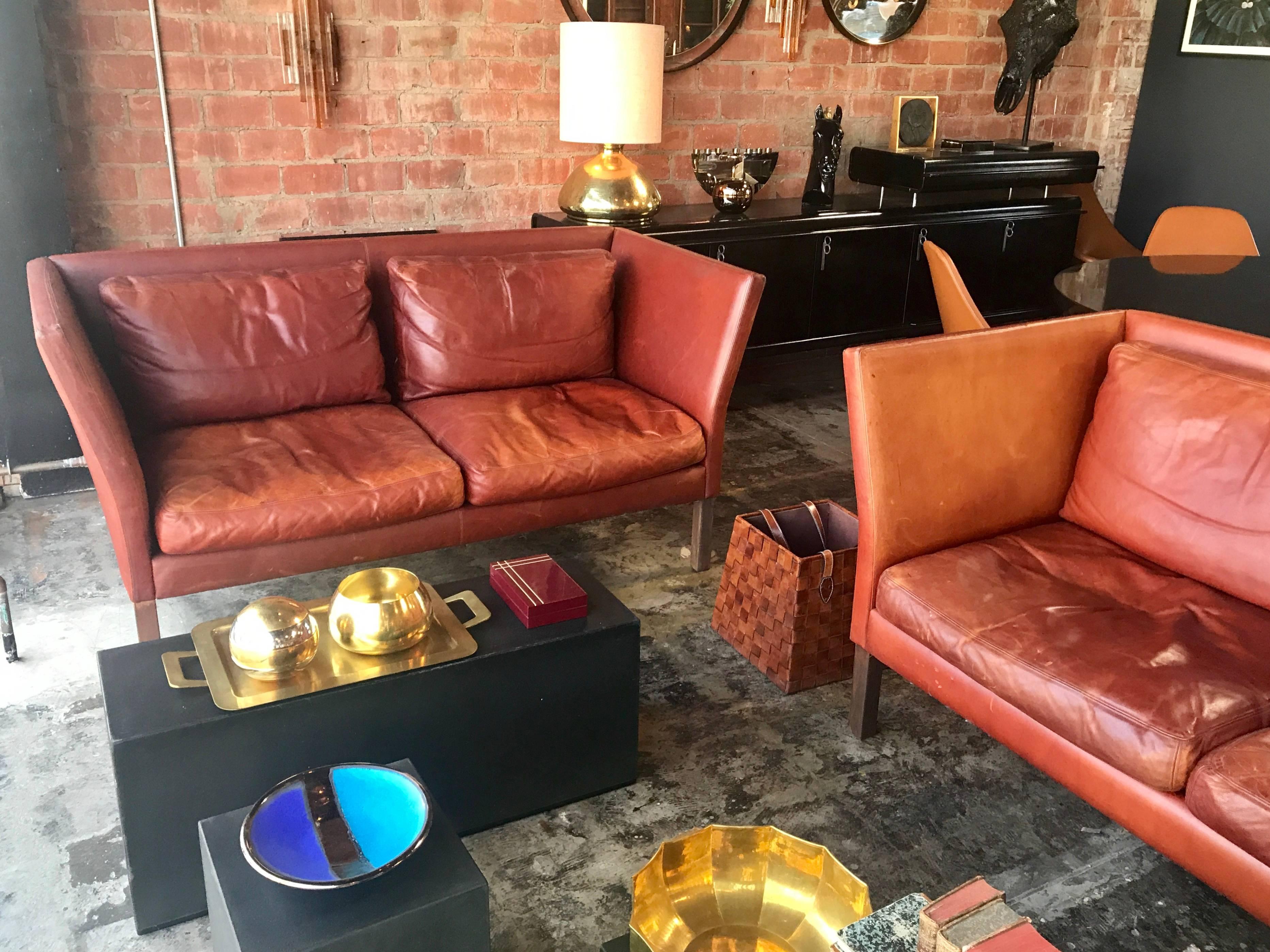 Mid-20th Century Mogens Hansen Sofas. From Denmark Pair of Cognac Leather Matching Sofas  