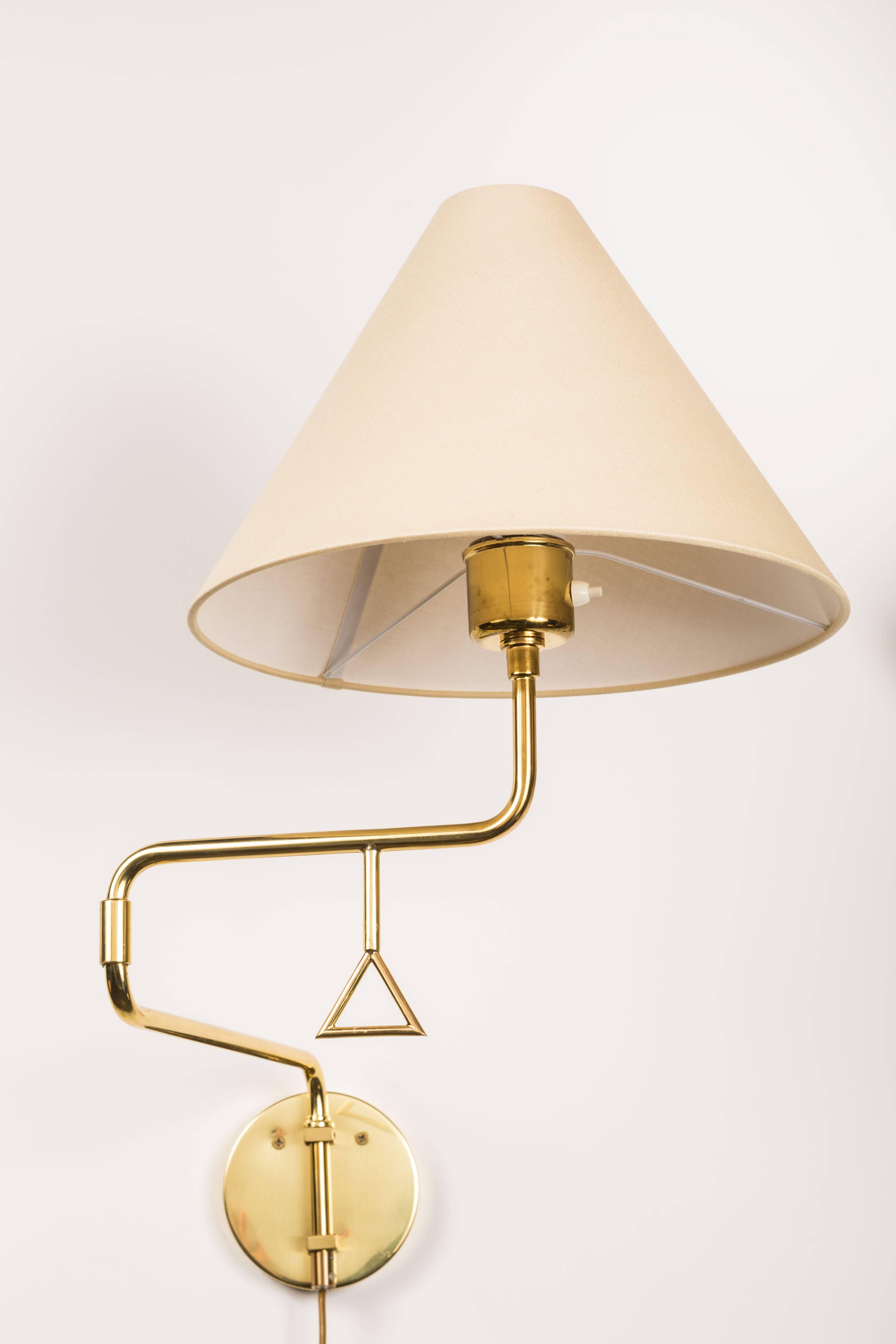 Mid-20th Century Pair of Brass Pivoting Sconces Made in Sweden