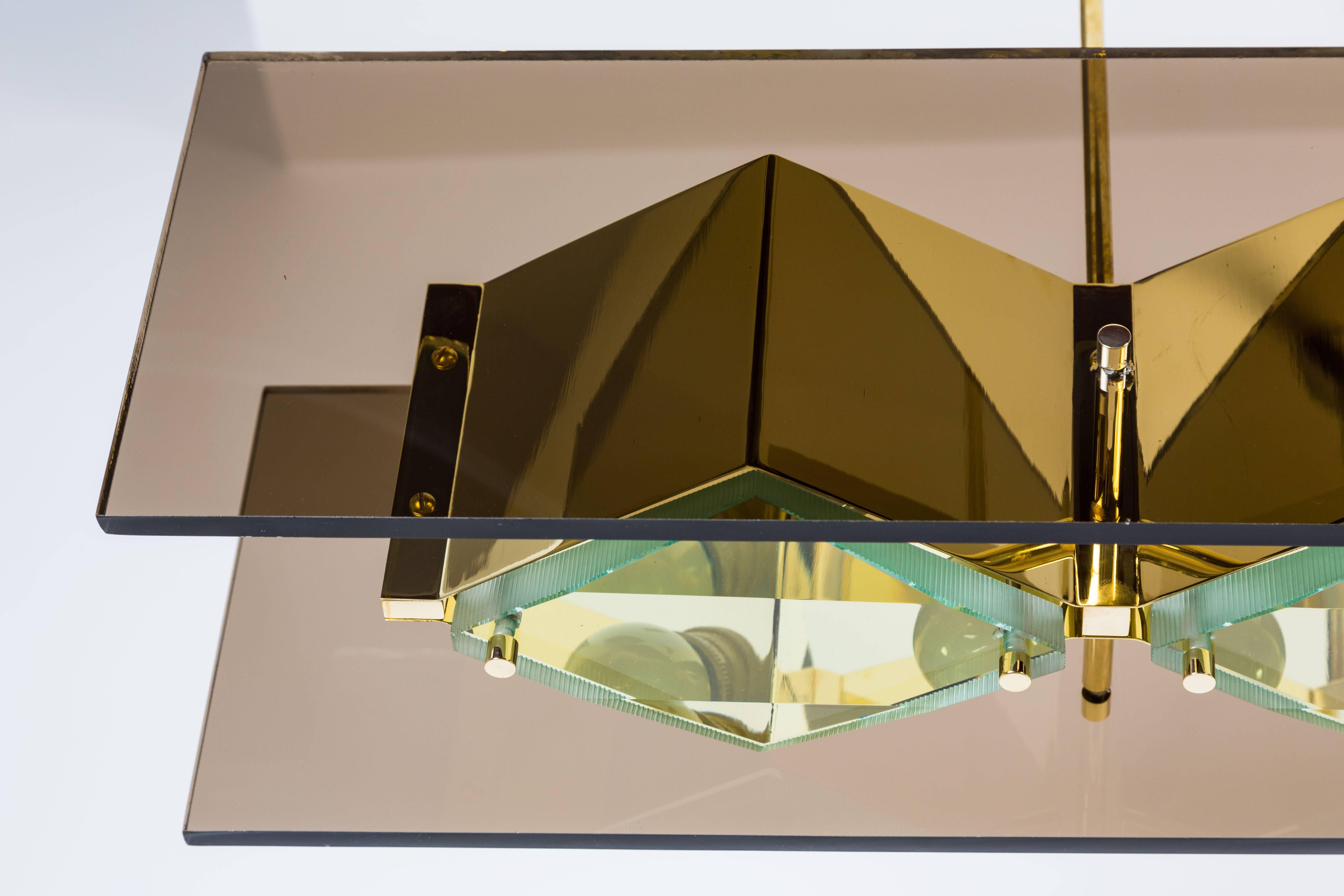 Mid-20th Century Stilnovo Chandelier with Brass Shades and Green Glass Diffusers