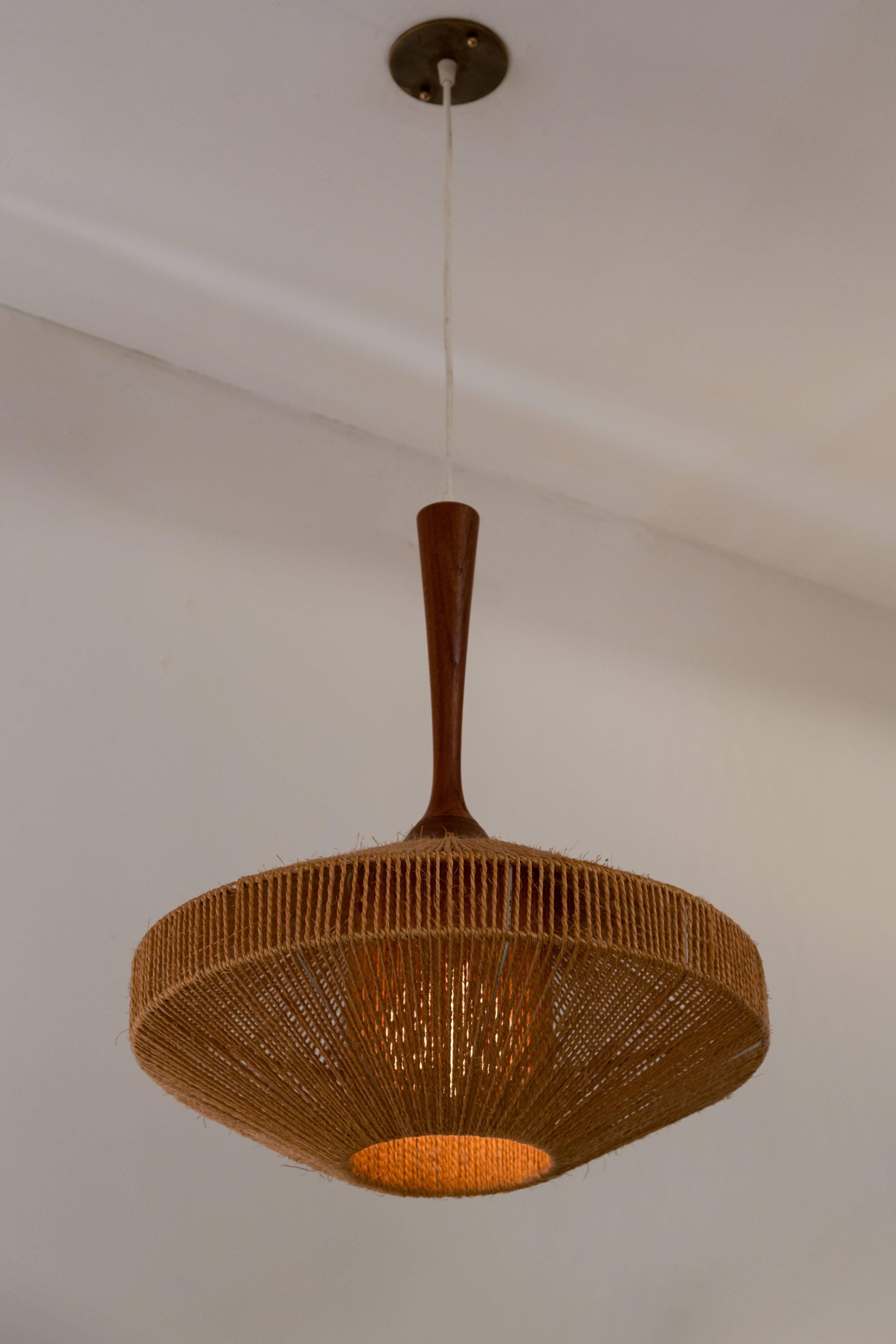 Teak stem with a woven jute wrapped shade. Overall drop can be customized. E26 75w maximum bulb.