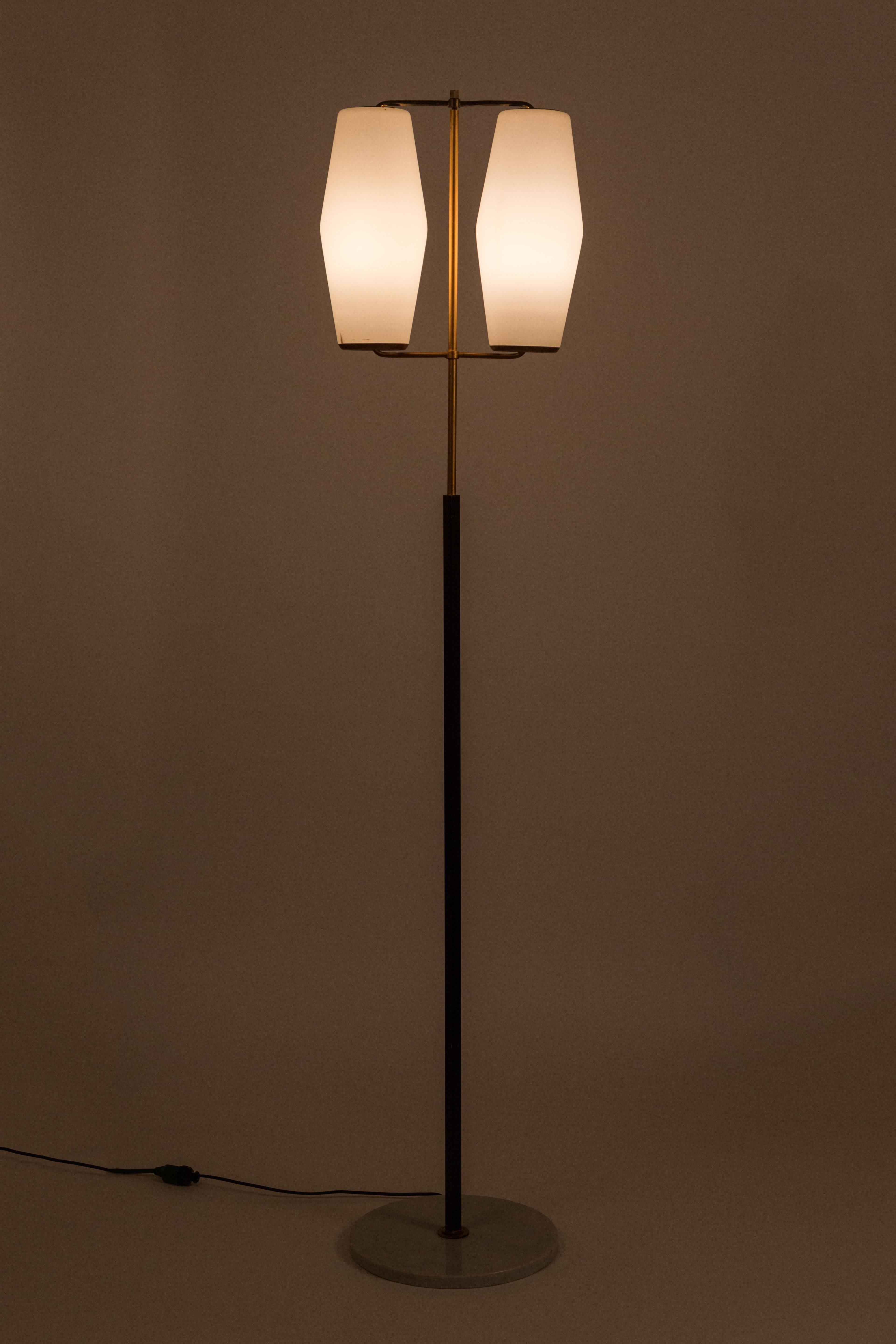 Large brass and metal floor lamp with two white glass shades and marble base by Stilnovo. Lamp retains original manufacturers label. Original wiring. Shades take E27 75w maximum bulbs.