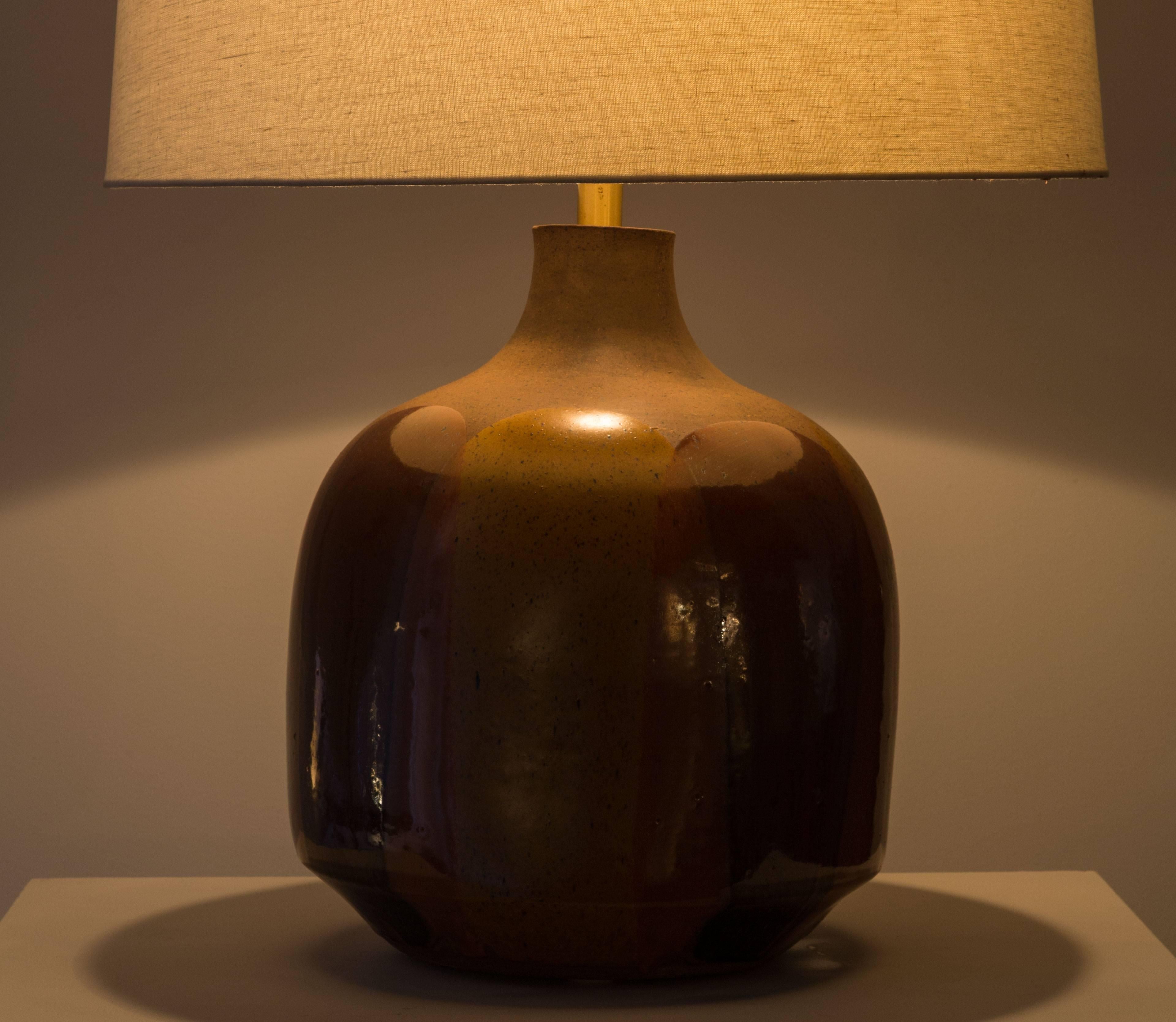 Ceramic hand glazed table lamp designed by David Cressey for Lightolier in the 1950s. Made in the U.S. Shade not included. Takes one E26 75w maximum bulb.