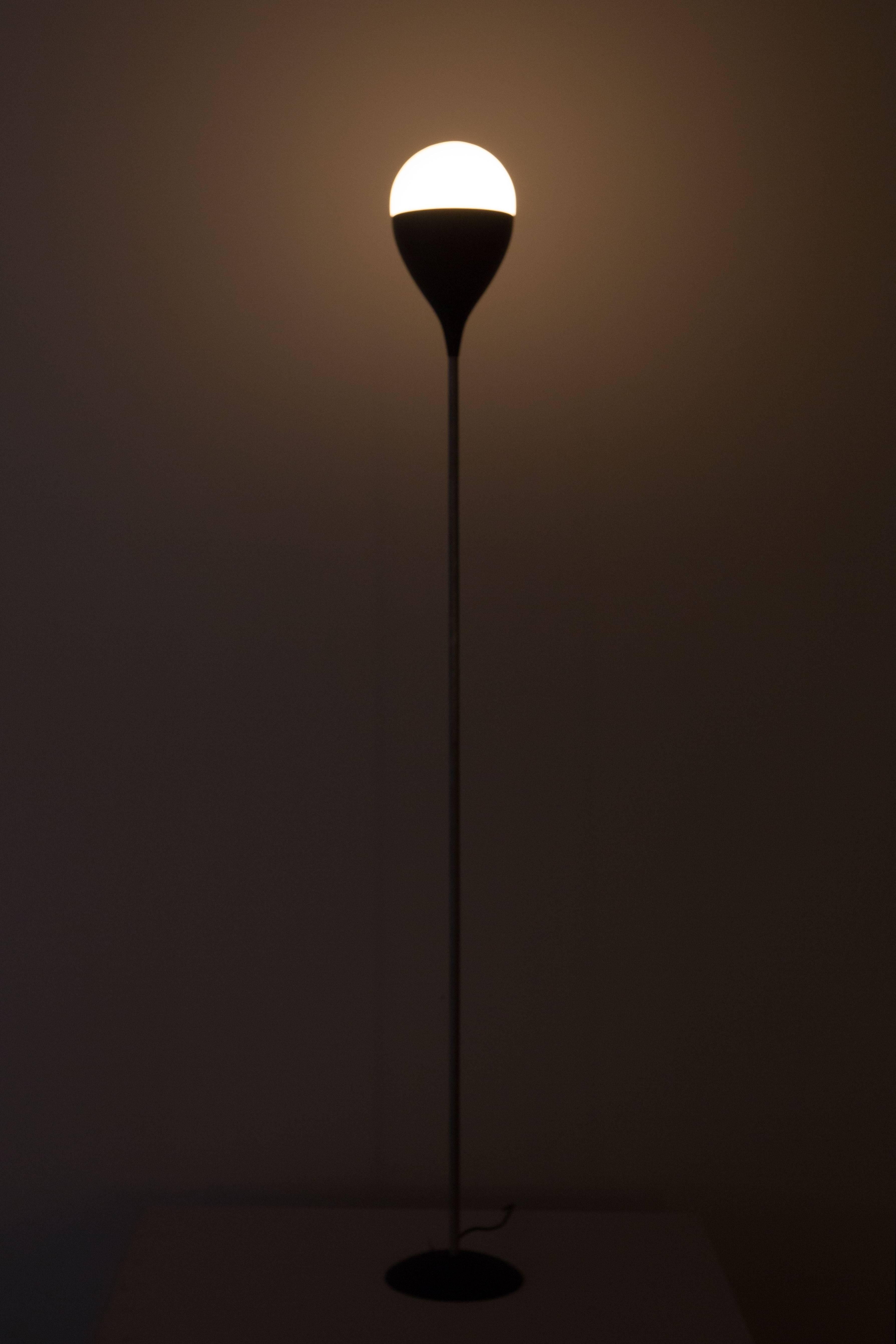 Floor lamp by Stilnovo made of die-cast aluminium with crease paint, nickel-plate brass, opal glass and cast iron base. Manufactured by Stilnovo in the late 1950s. Original label and cord. Takes an E27 75W maximum bulb.
 