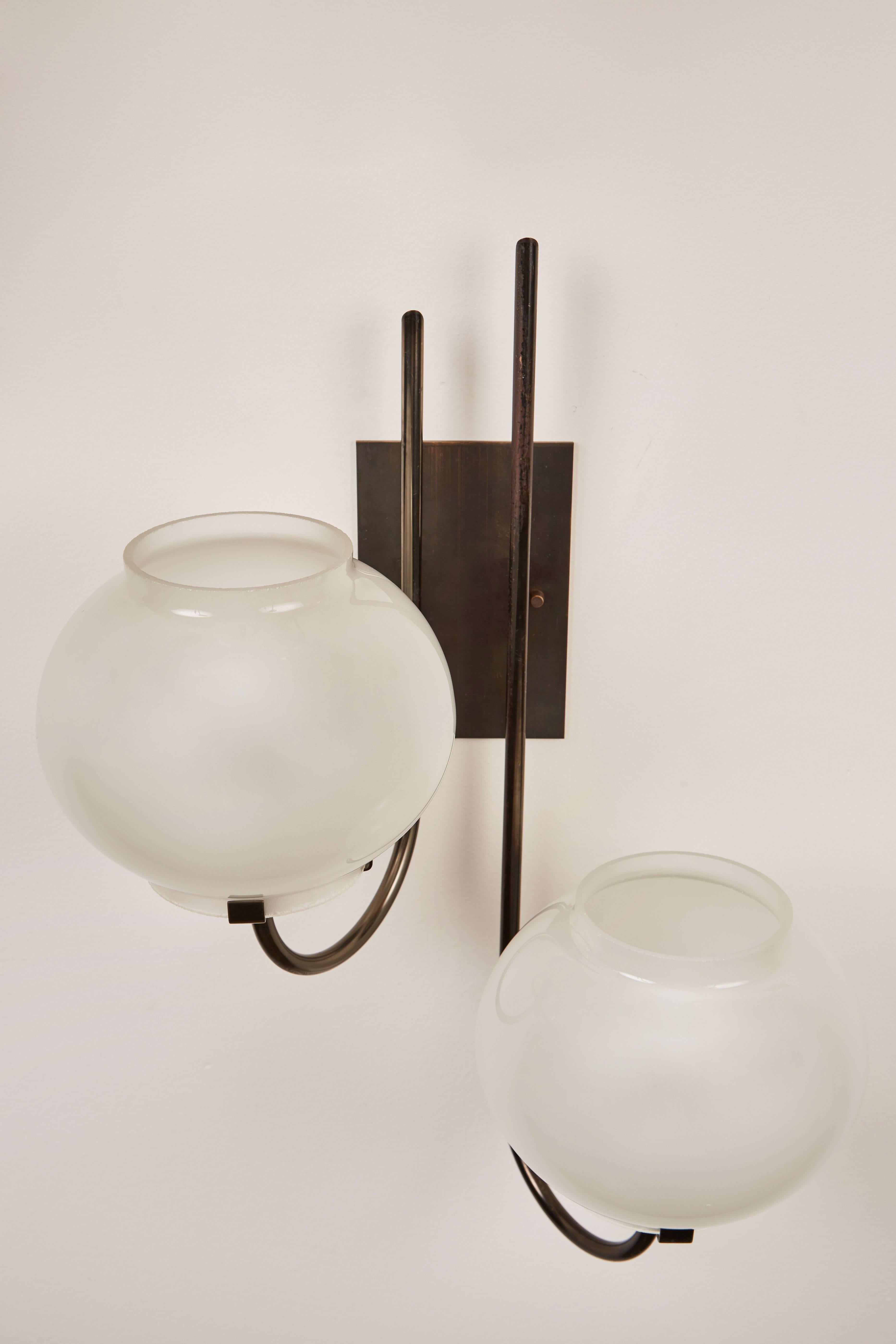 Italian Pair of Sconces by Tito Agnoli for Oluce 