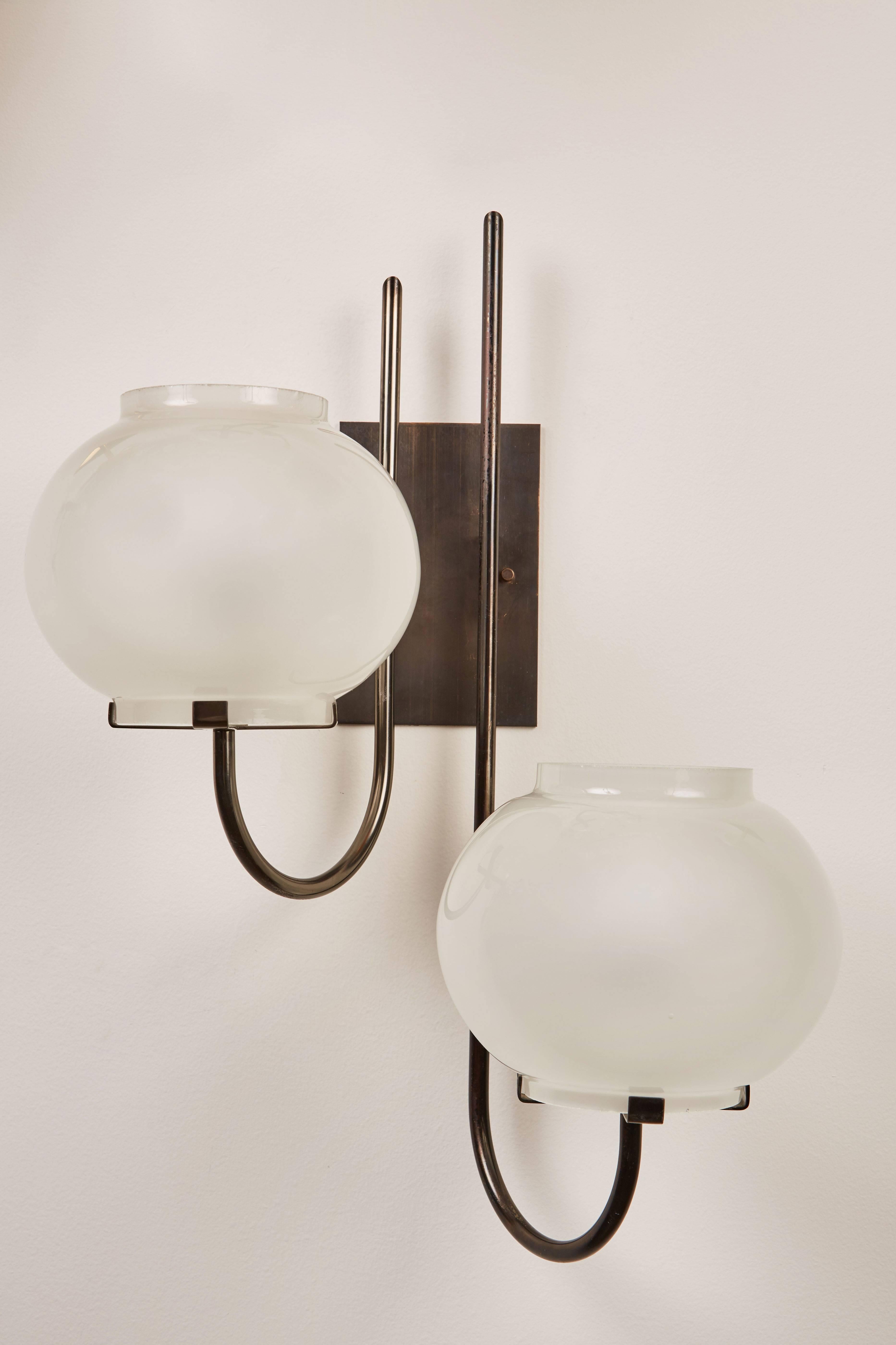 Late 20th Century Pair of Sconces by Tito Agnoli for Oluce  For Sale